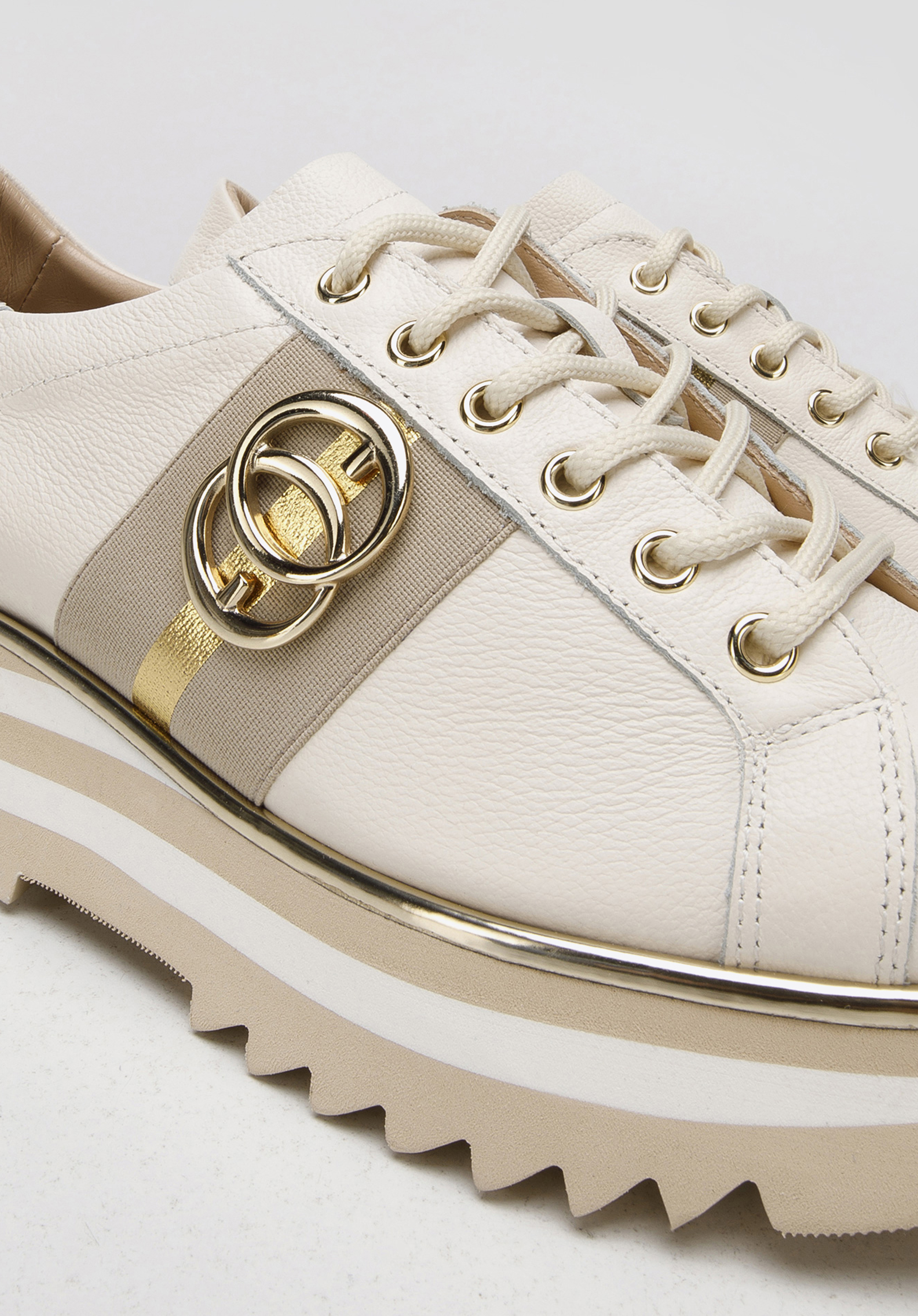 Damskie sneakersy skórzane z klamrą na platformie w pasy