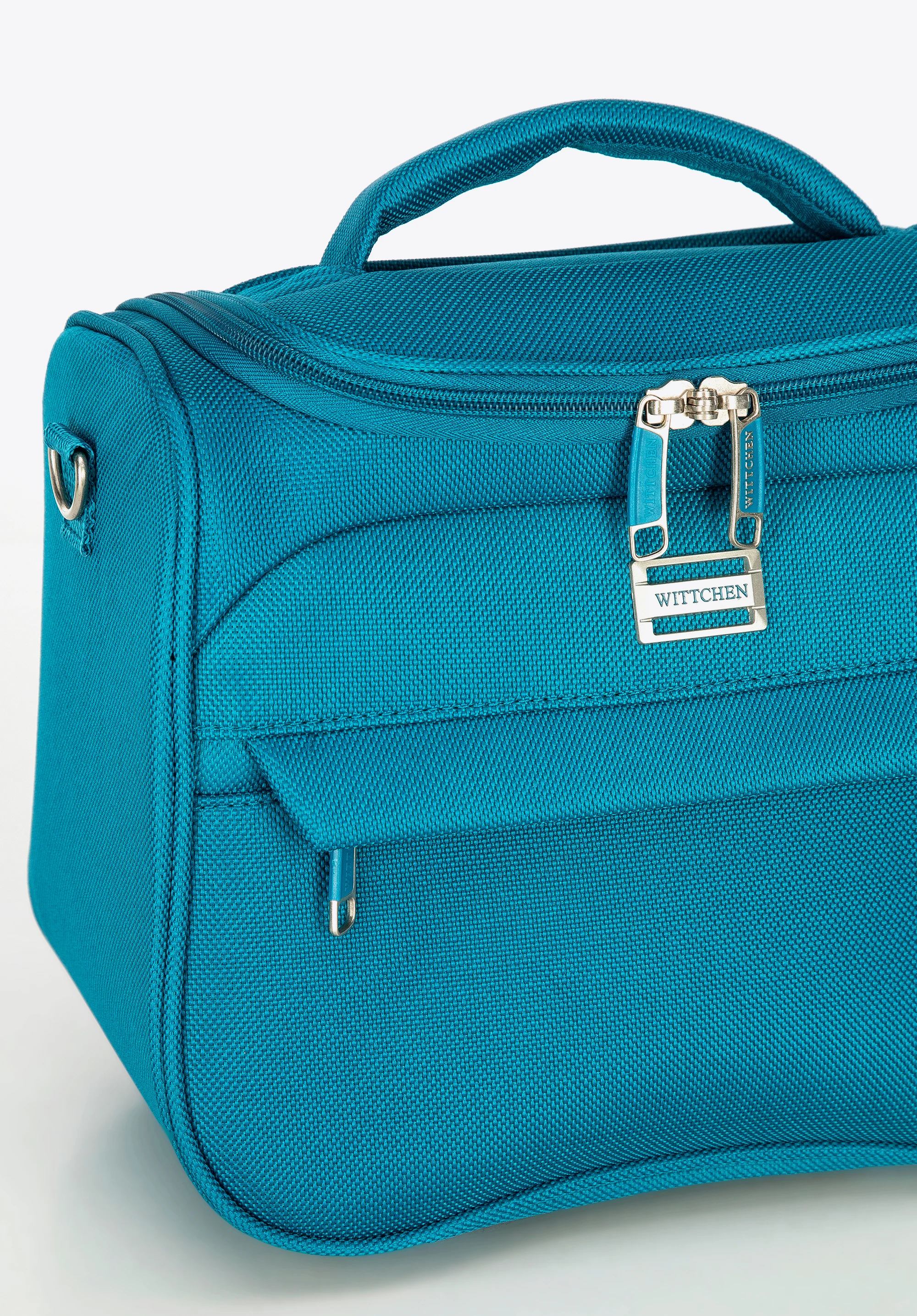 Mała walizka miękka jednokolorowa