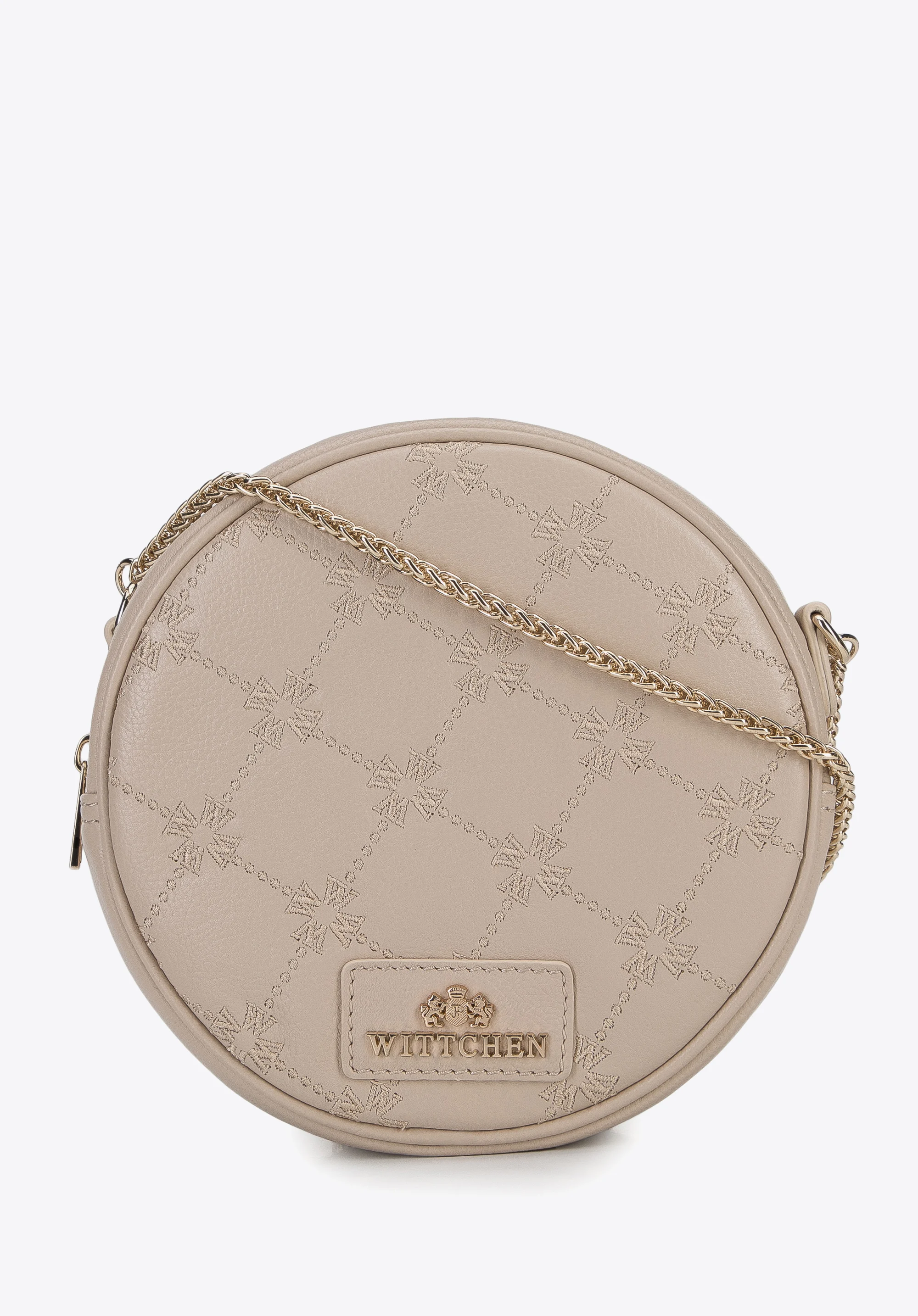 Damska torebka skórzana z haftowanym monogramem okrągła