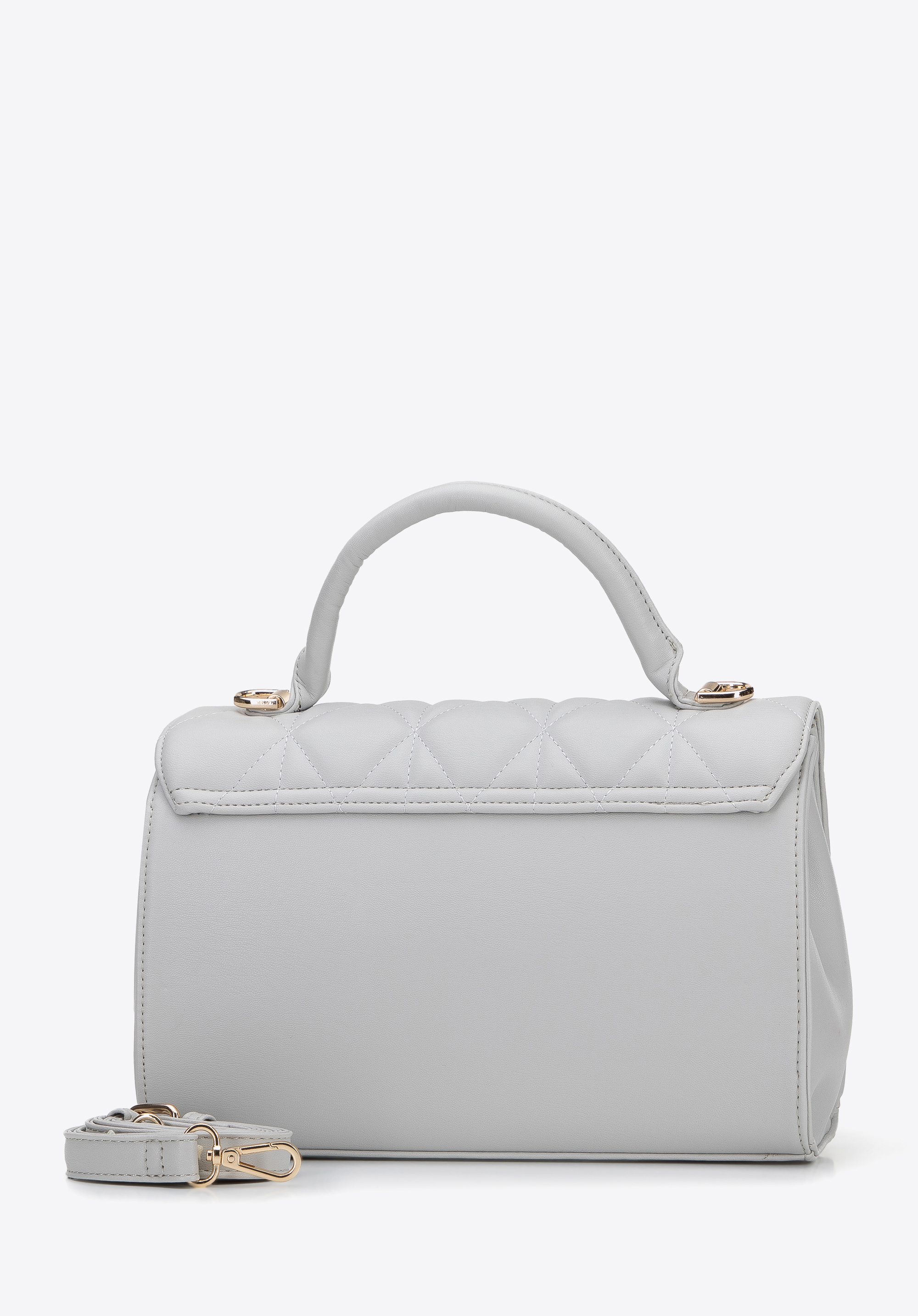 Torebka kuferek z pikowanej ekoskóry z nitami