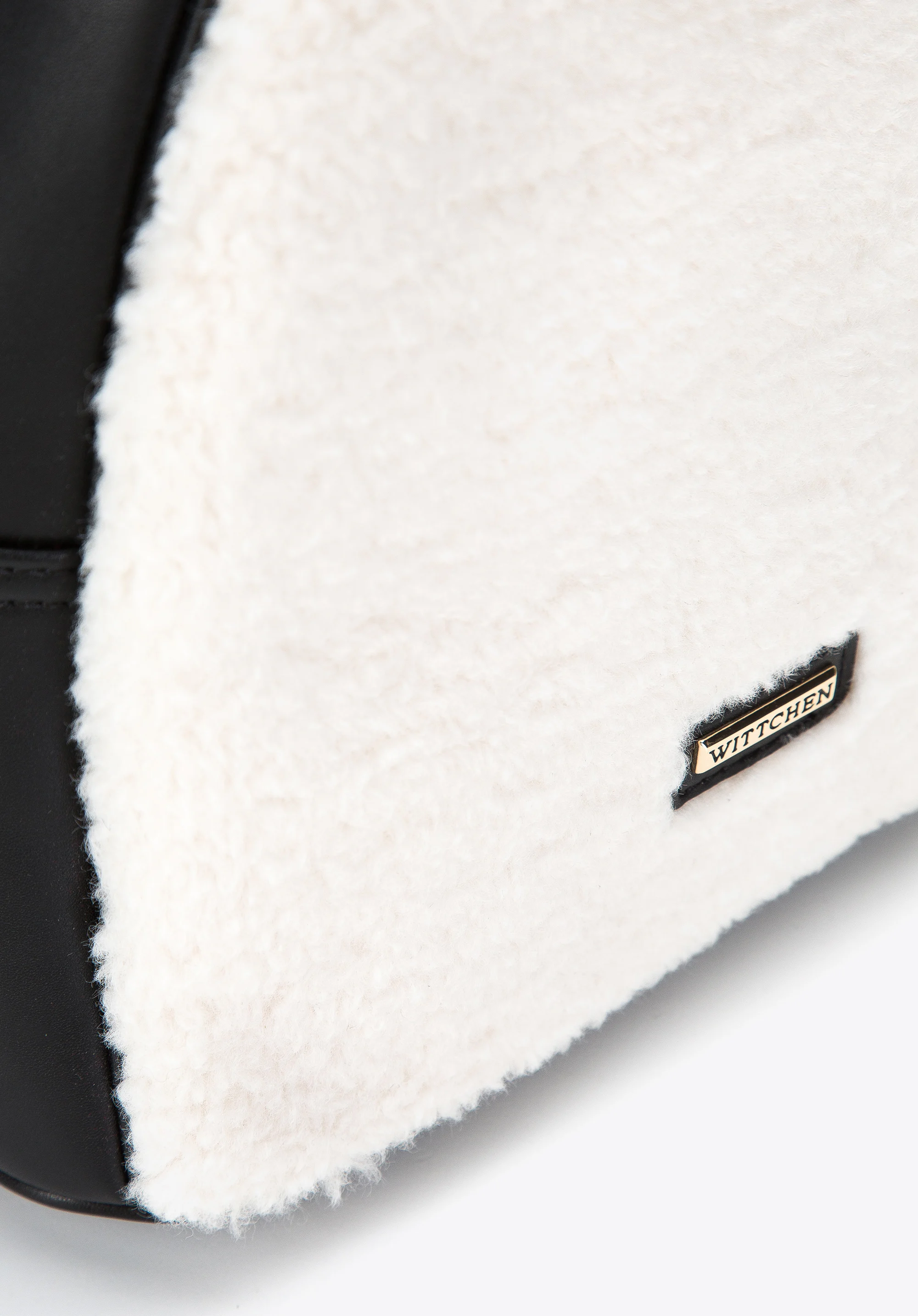 Damski plecak z przodem ze sztucznego futerka