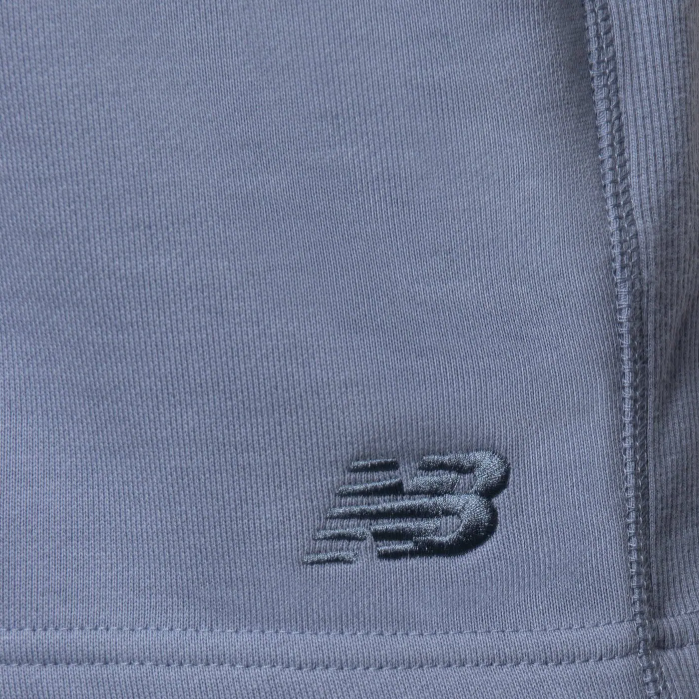 NEW BALANCE RÖVIDNADRÁG ATHLETICS   FRENCH TERRY SHORT 5