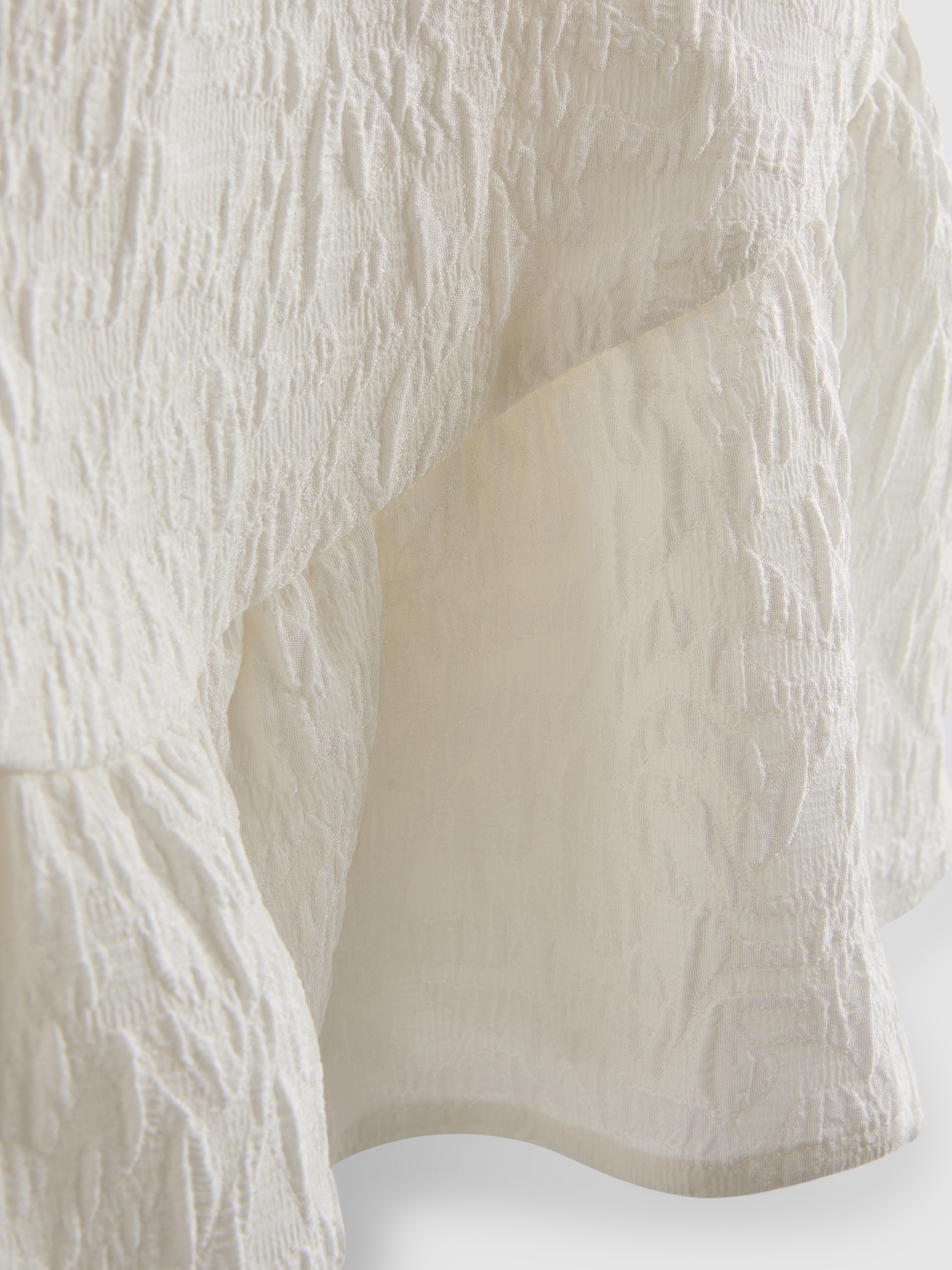 Textured Corset Peplum Top