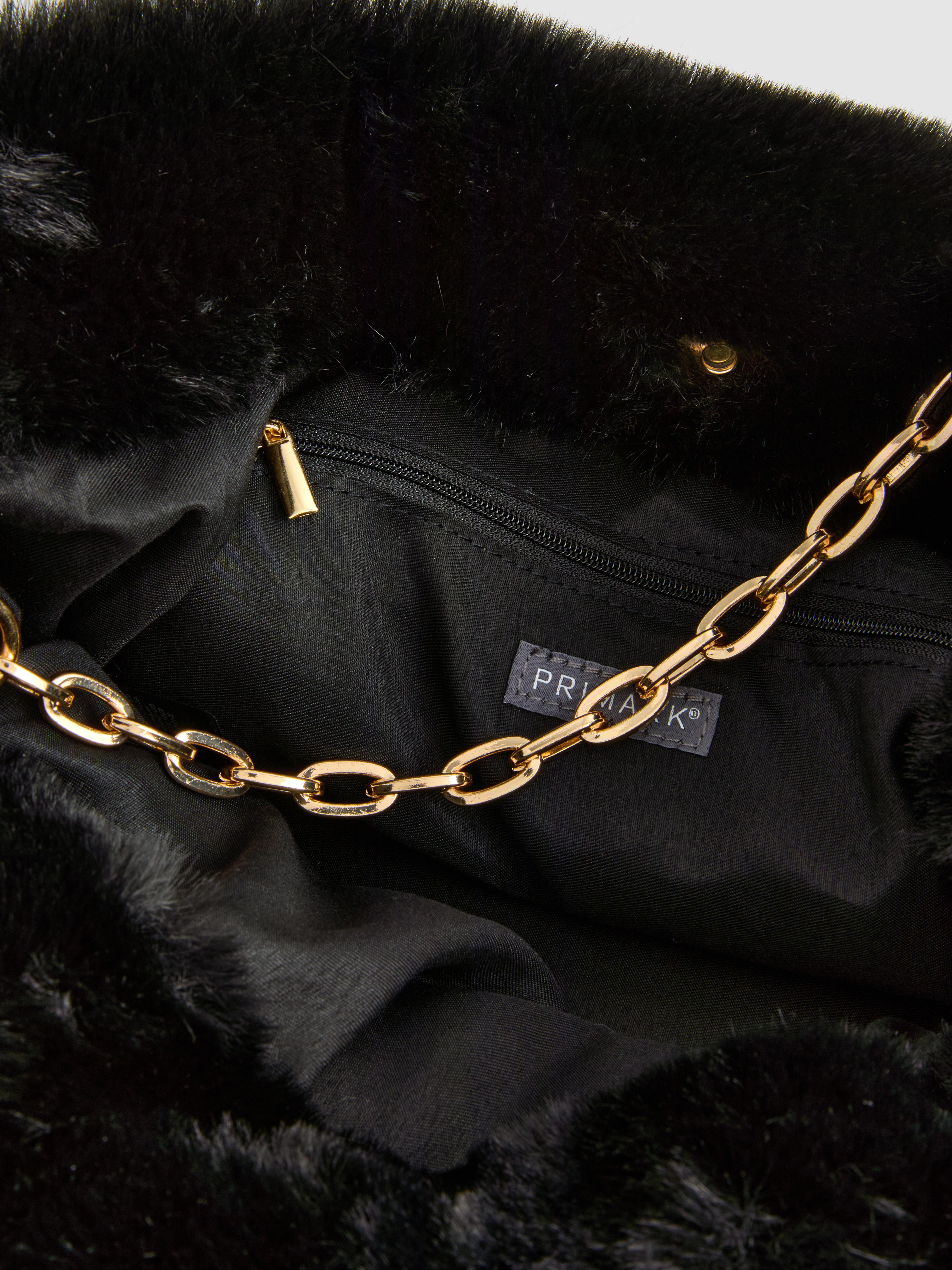 Paula Echevarría Faux Fur Pouch