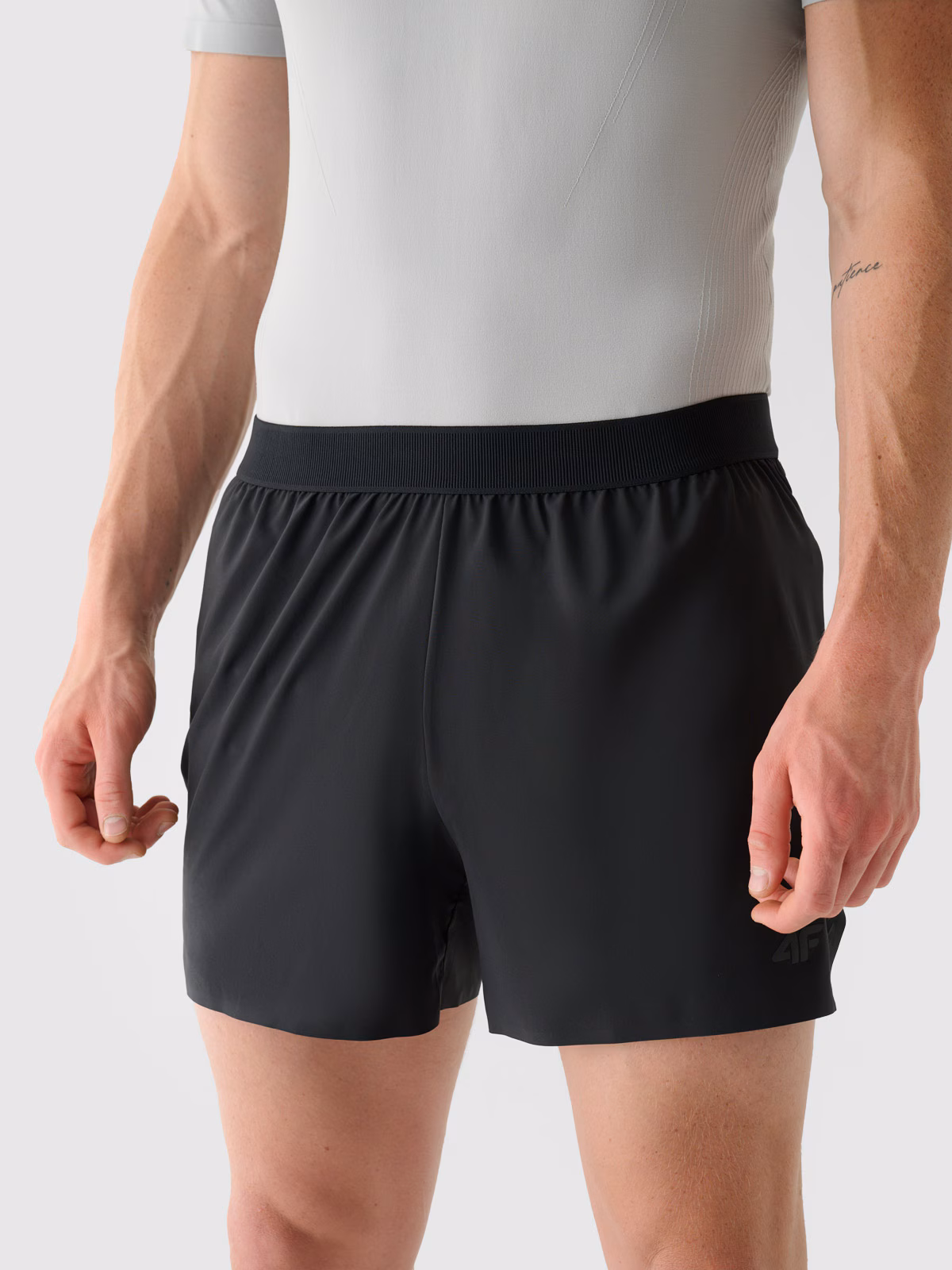 Spodenki do biegania szybkoschnące męskie - fioletowe