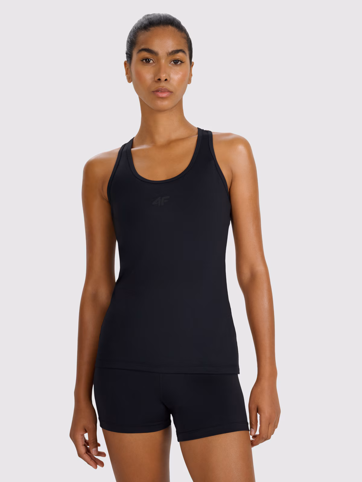 Top treningowy slim szybkoschnący damski - czarny