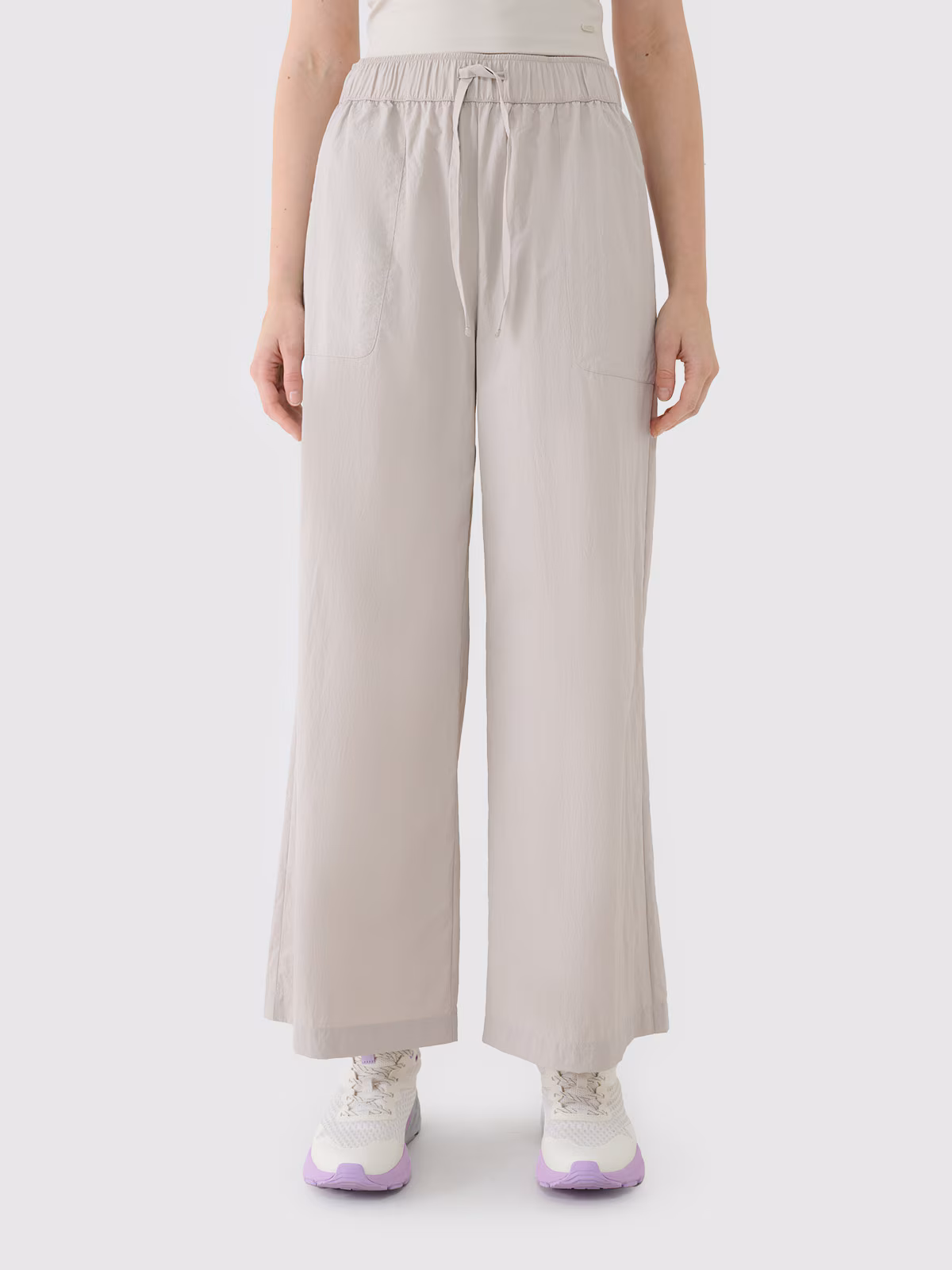 Spodnie casual z szerokimi nogawkami damskie - beżowe