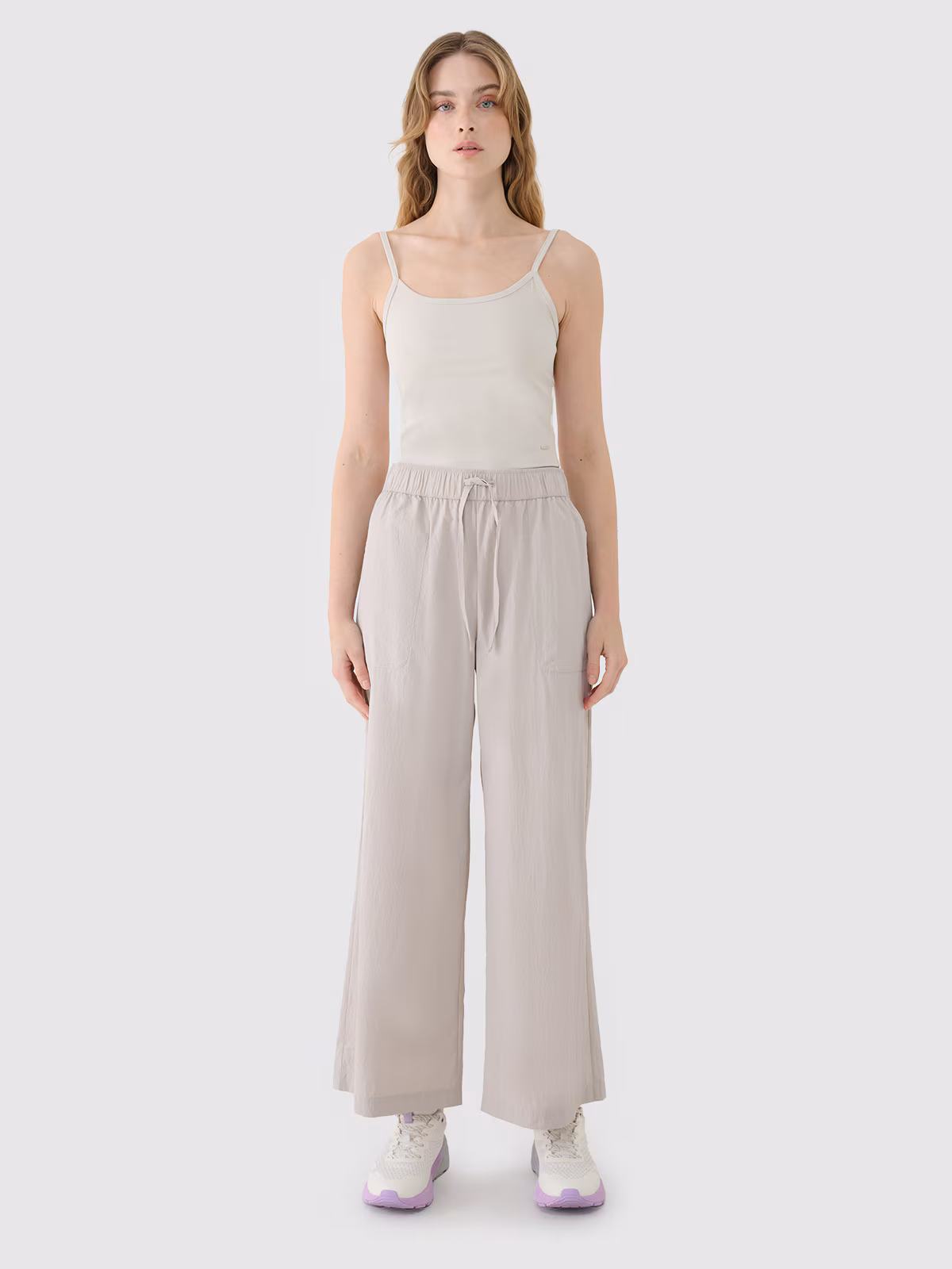 Spodnie casual z szerokimi nogawkami damskie - beżowe