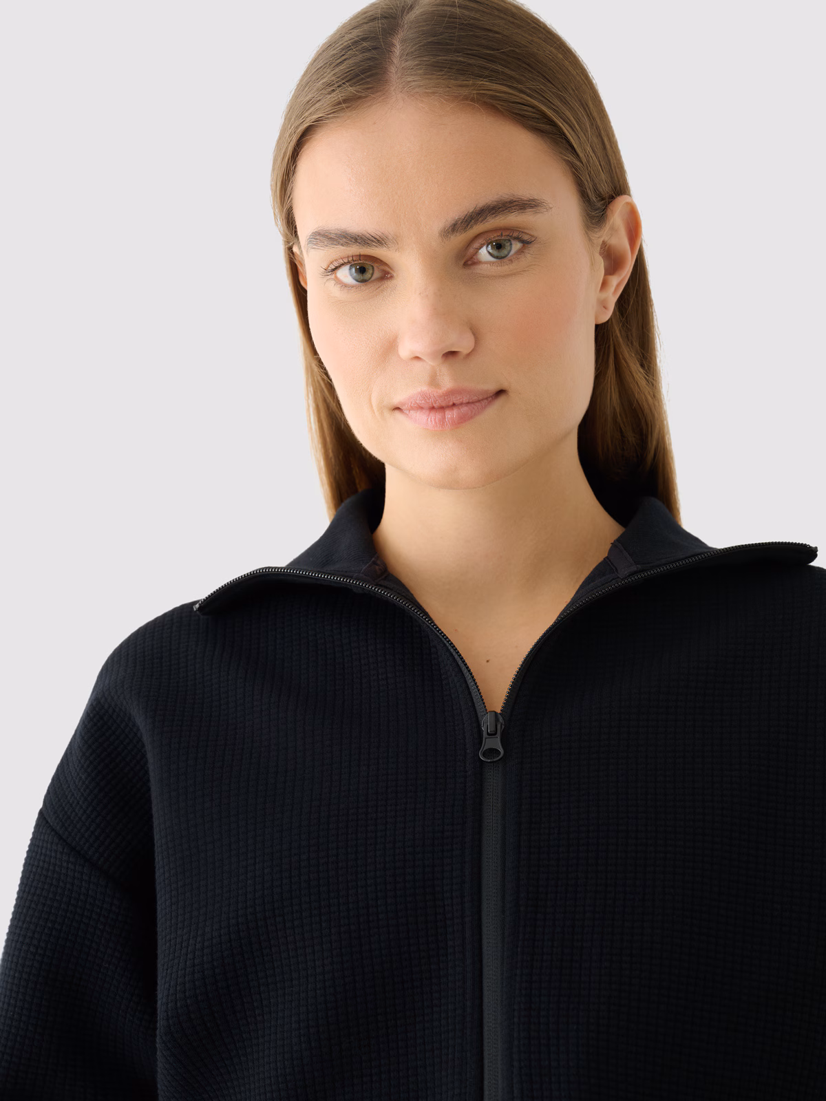 Bluza crop top rozpinana bez kaptura damska - zielona