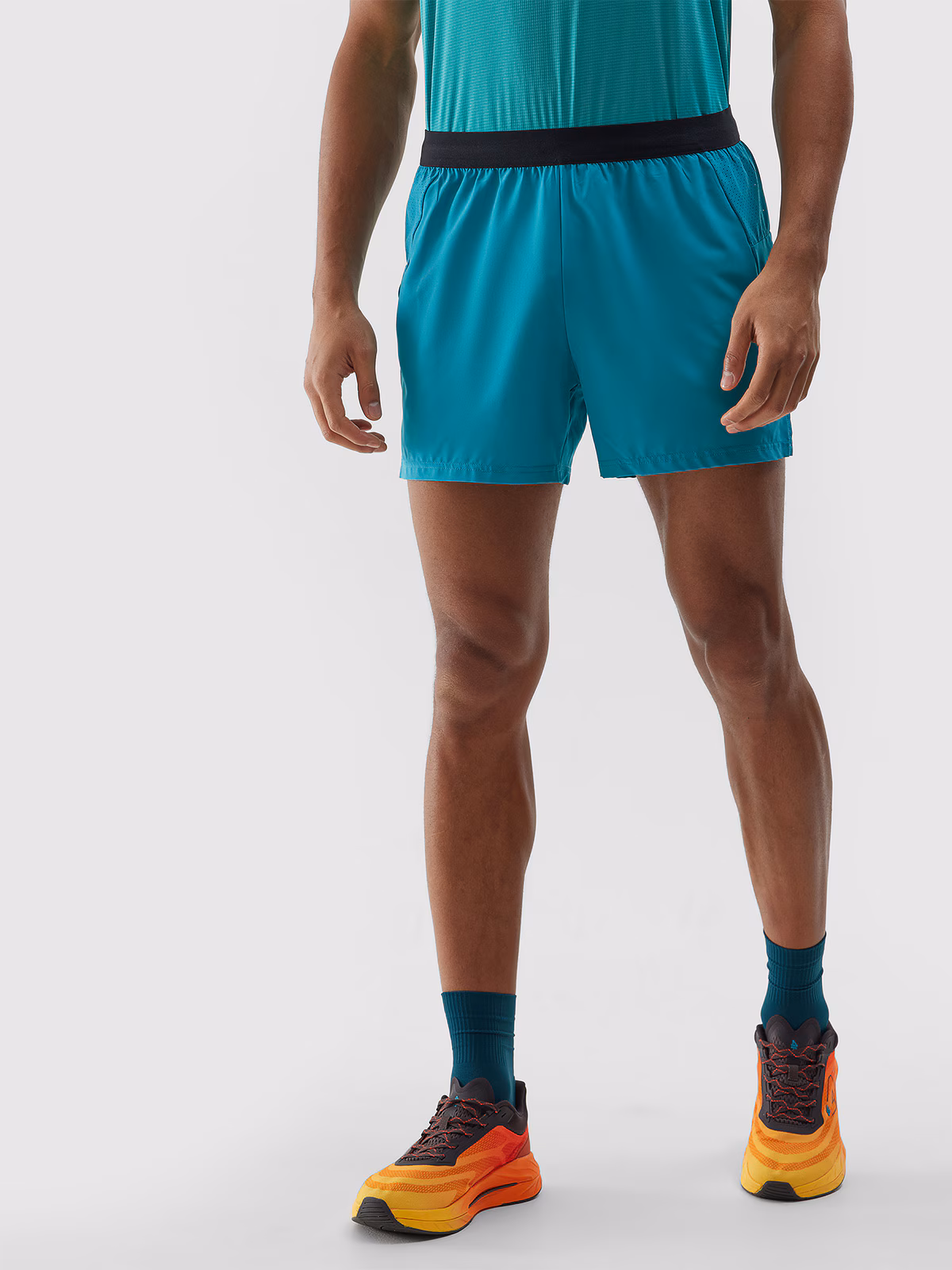 Spodenki do biegania szybkoschnące męskie - turkusowe