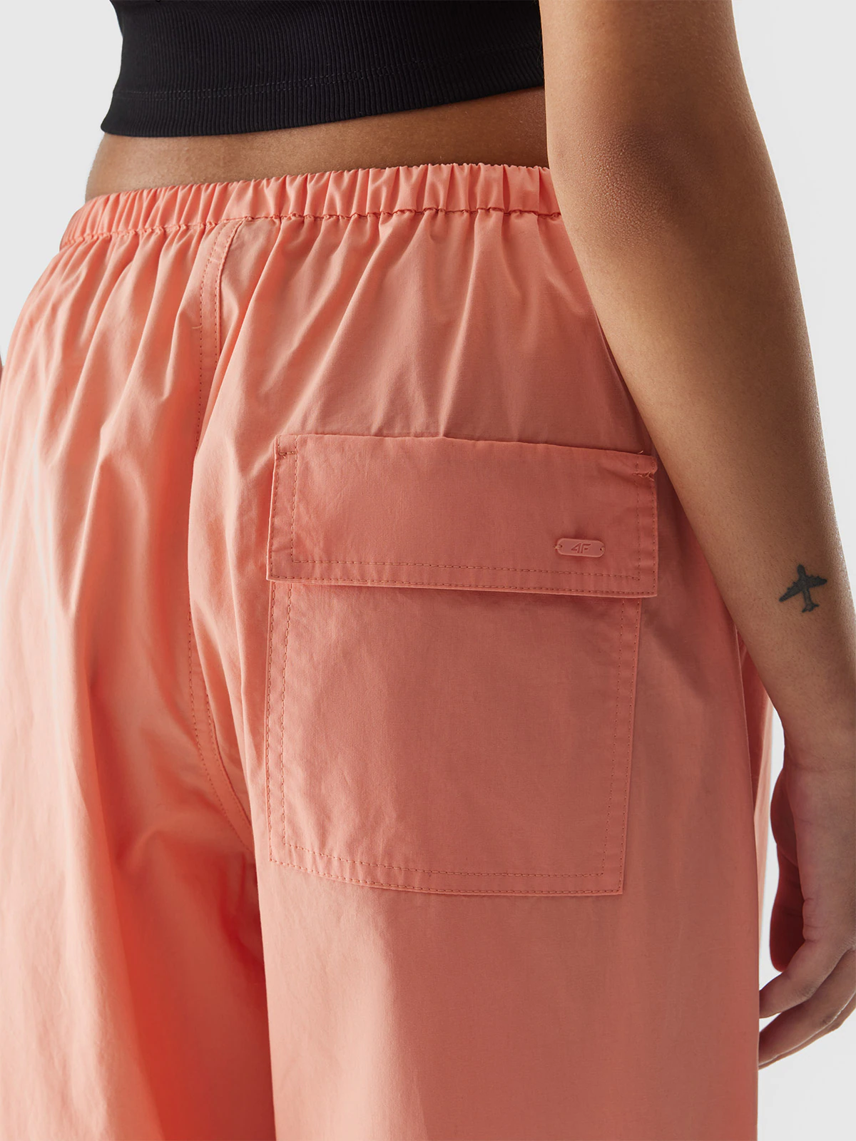 Spodnie casual baggy parachute damskie - łososiowy