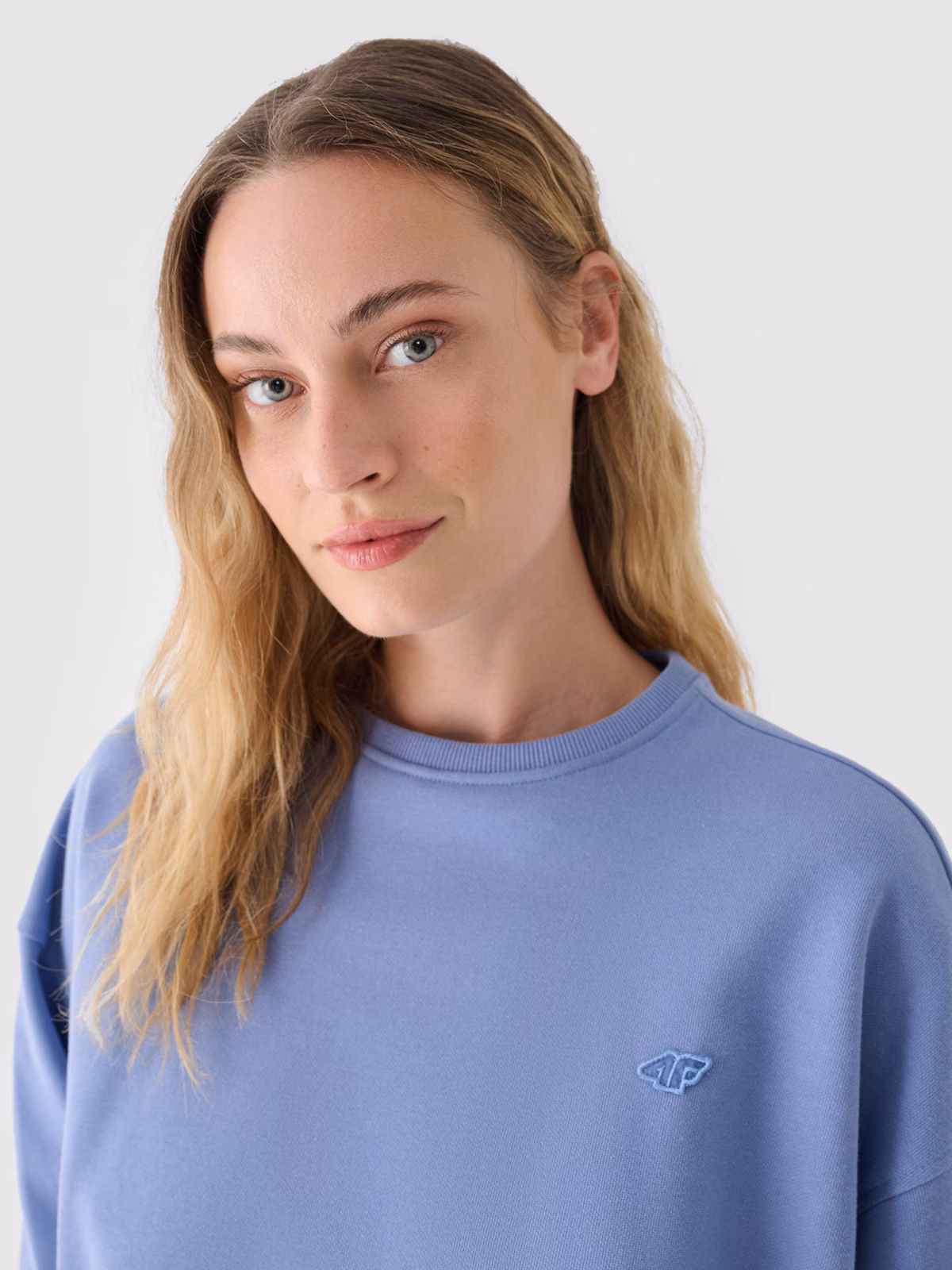 Bluza dresowa nierozpinana bez kaptura damska - różowa