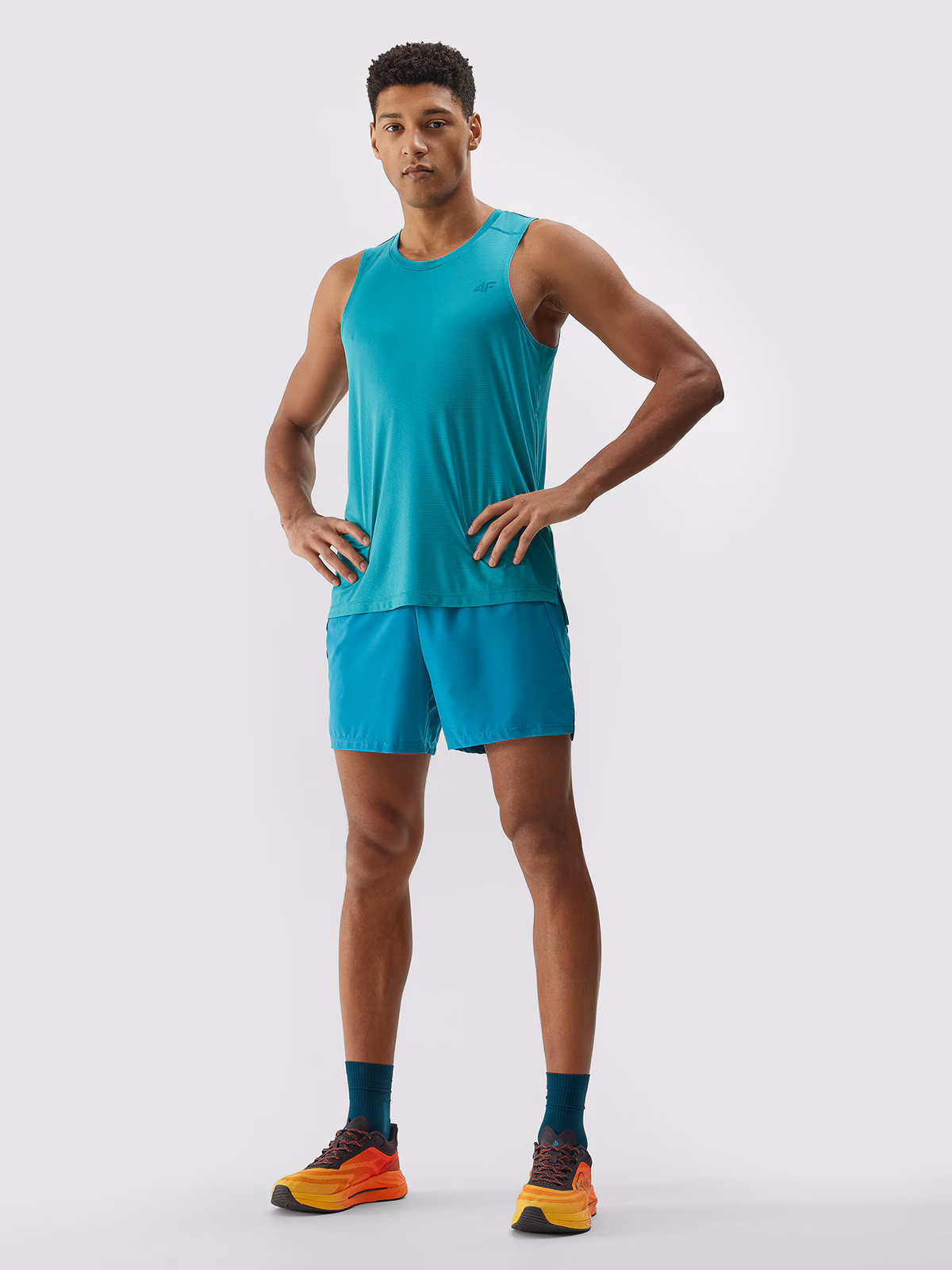 Spodenki do biegania szybkoschnące męskie - turkusowe