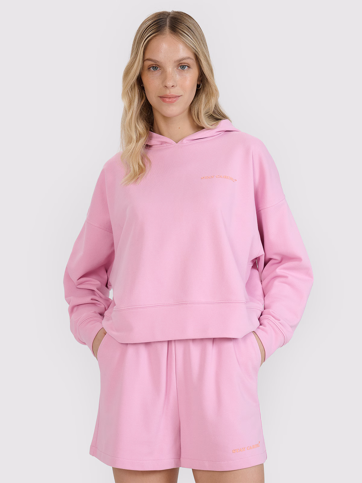 Bluza dresowa nierozpinana z kapturem damska - pomarańczowa