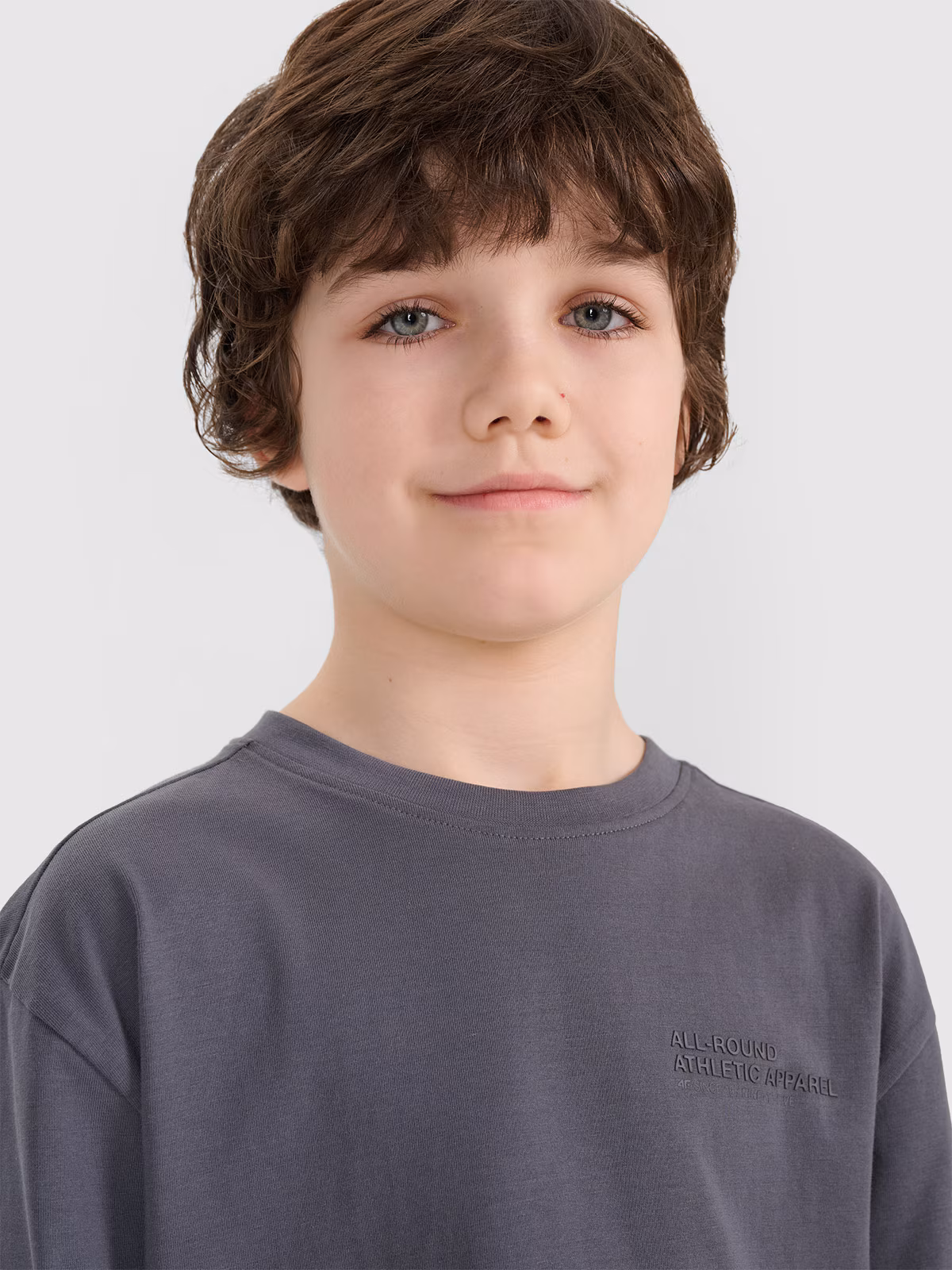 Longsleeve oversize z nadrukiem chłopięcy - beżowy