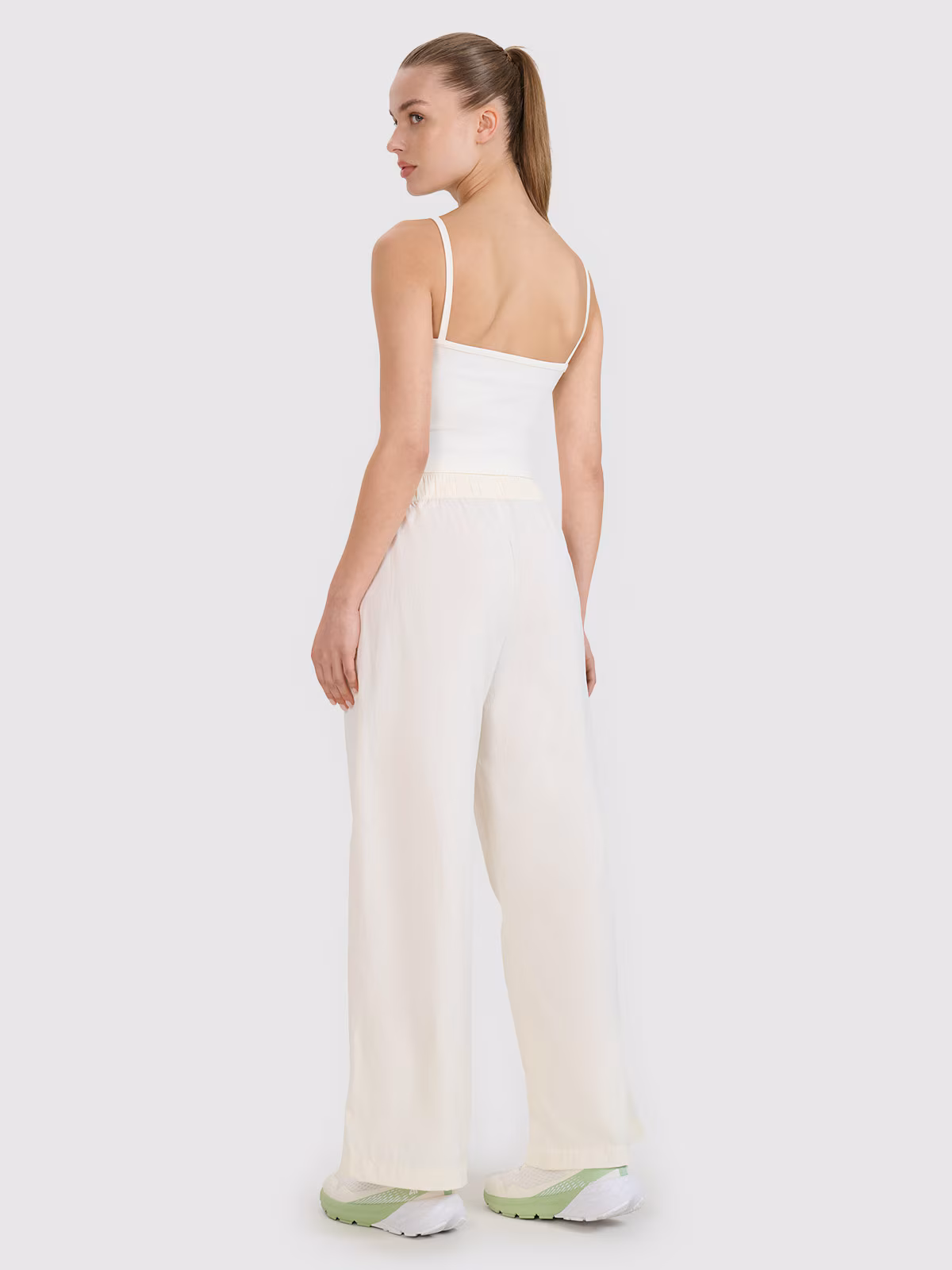 Spodnie casual z szerokimi nogawkami damskie - beżowe