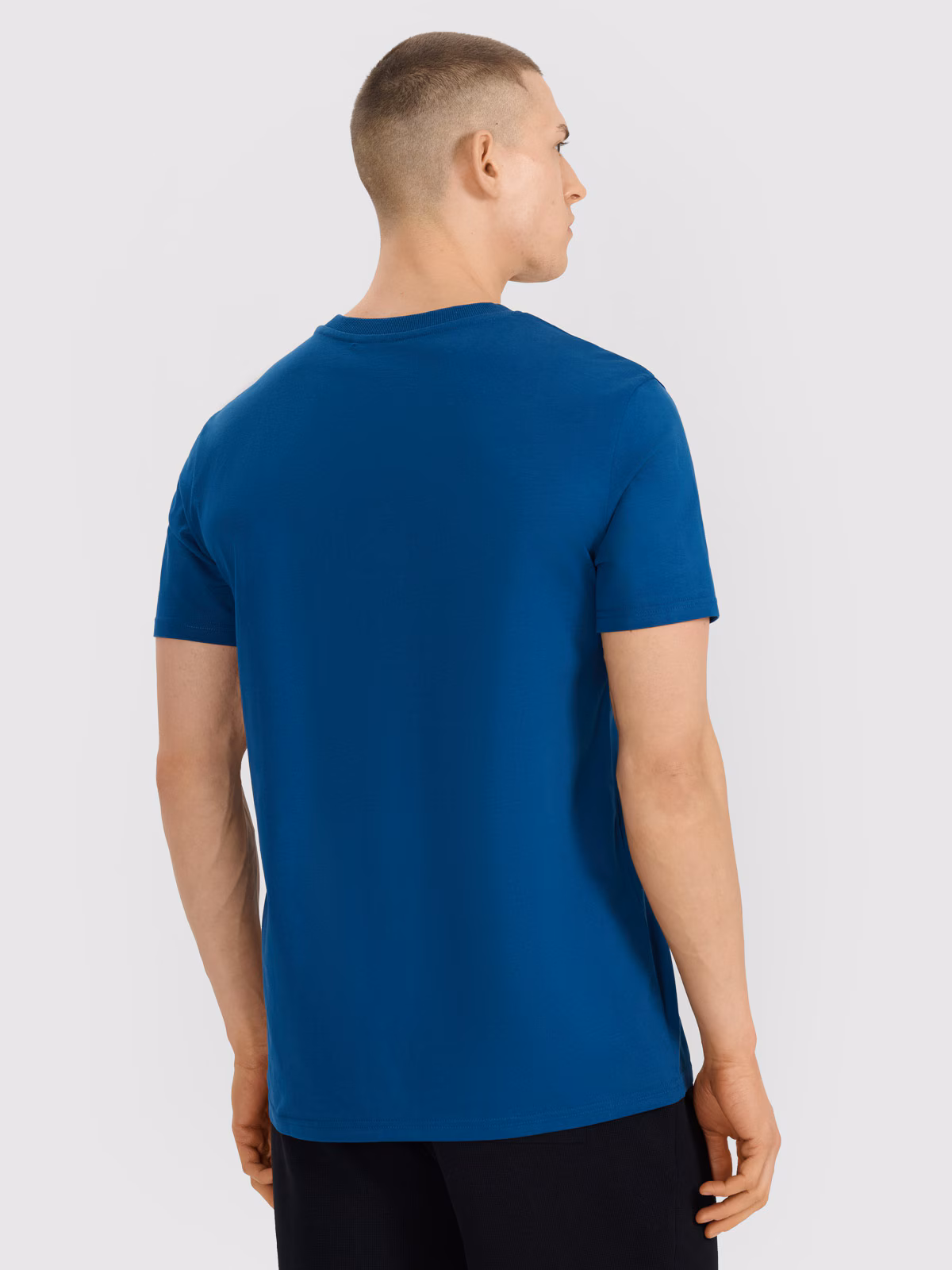 T-shirt regular z nadrukiem męski - turkusowy