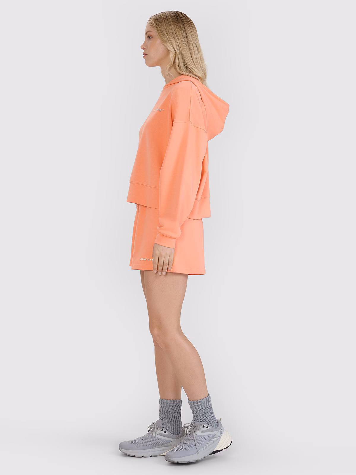 Bluza dresowa nierozpinana z kapturem damska - pomarańczowa