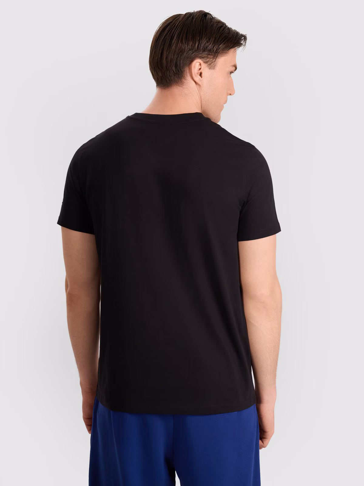 T-shirt regular z nadrukiem siatkarskim męski - biały