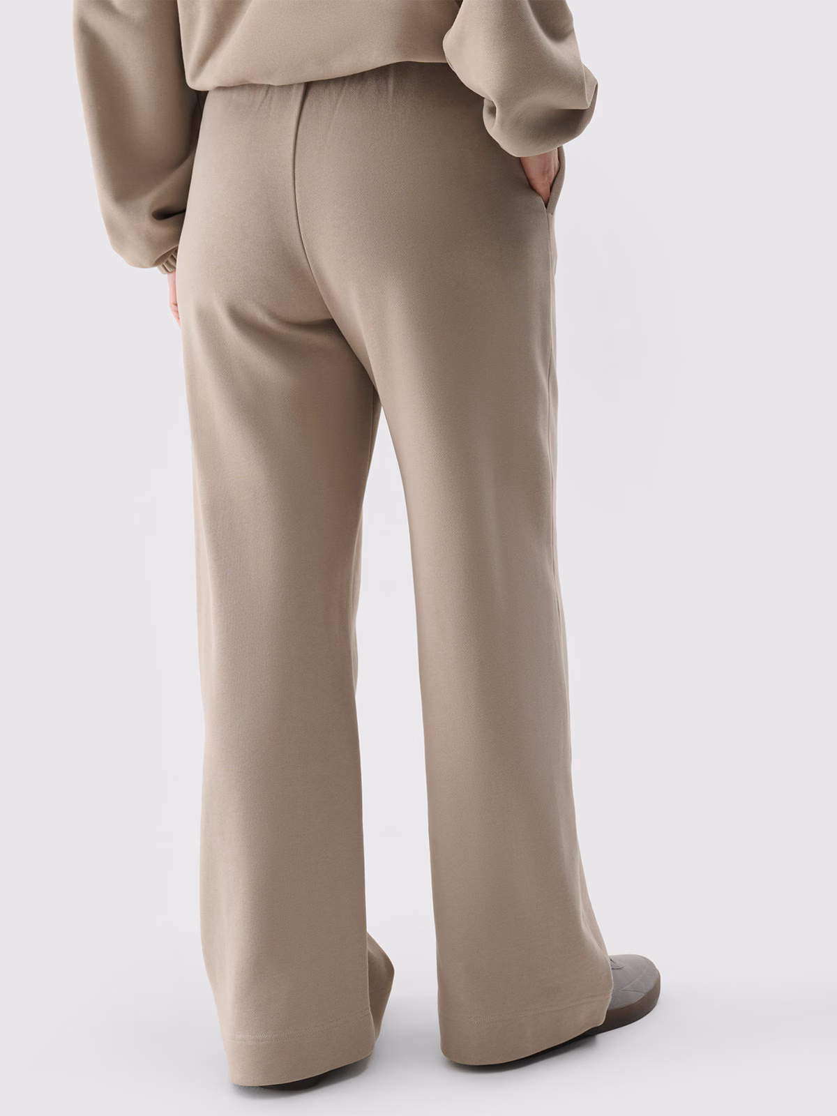 Spodnie dresowe z szerokimi nogawkami damskie - beżowe