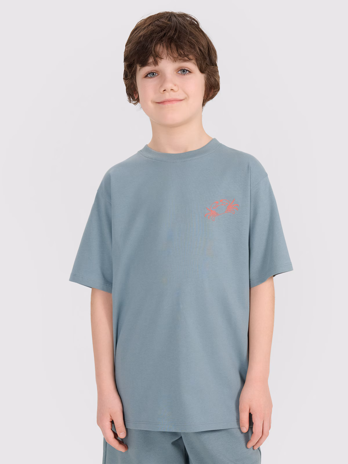 T-shirt oversize z nadrukiem chłopięcy - turkusowy