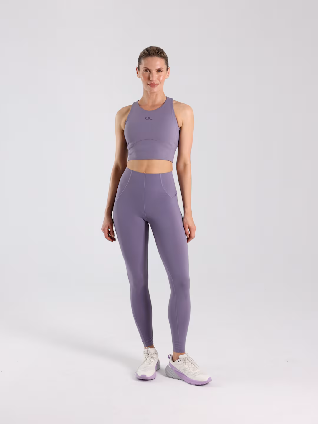 Crop top treningowy z wycięciem na plecach 4F x Anna Lewandowska - fioletowy