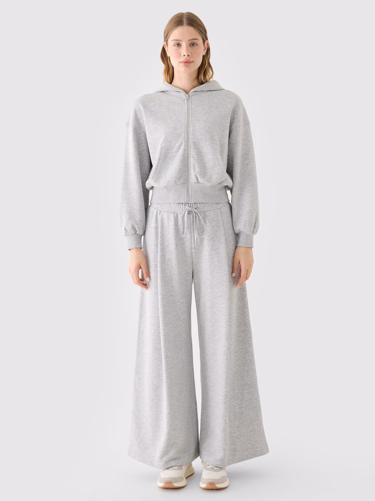 Spodnie dresowe z szerokimi nogawkami damskie - szare