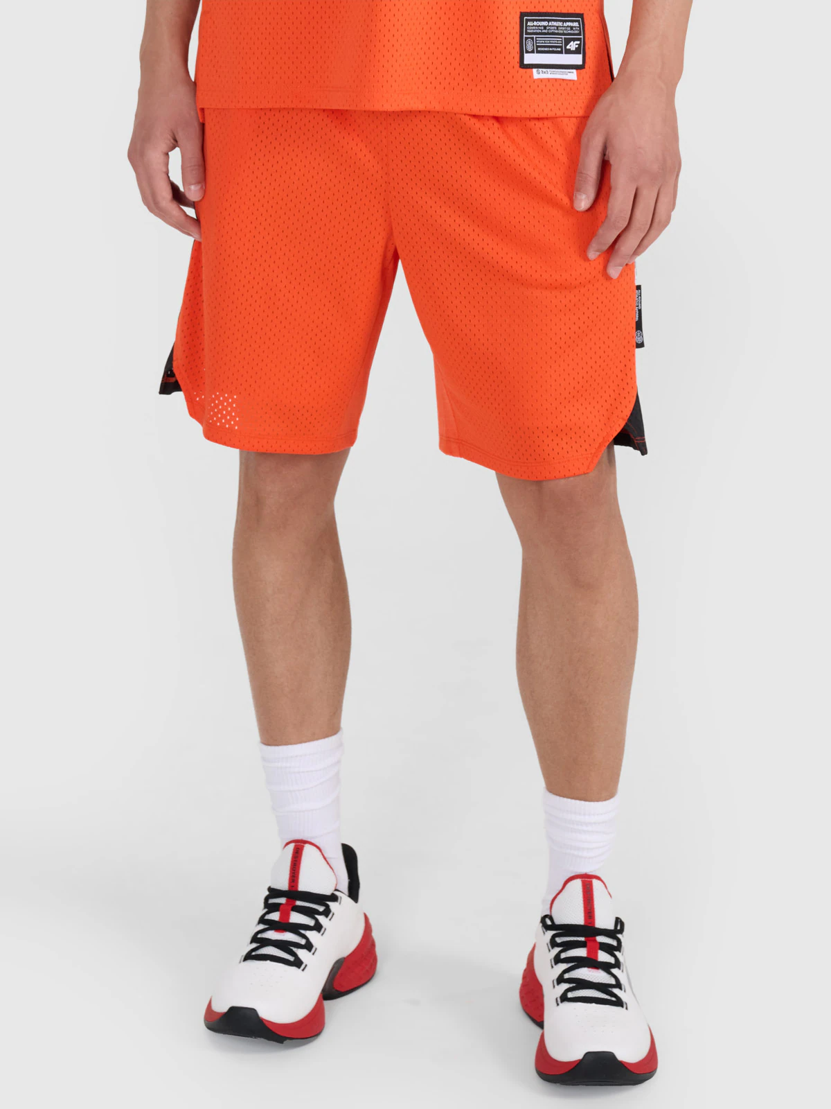 Spodenki do koszykówki szybkoschnące męskie - pomarańczowe