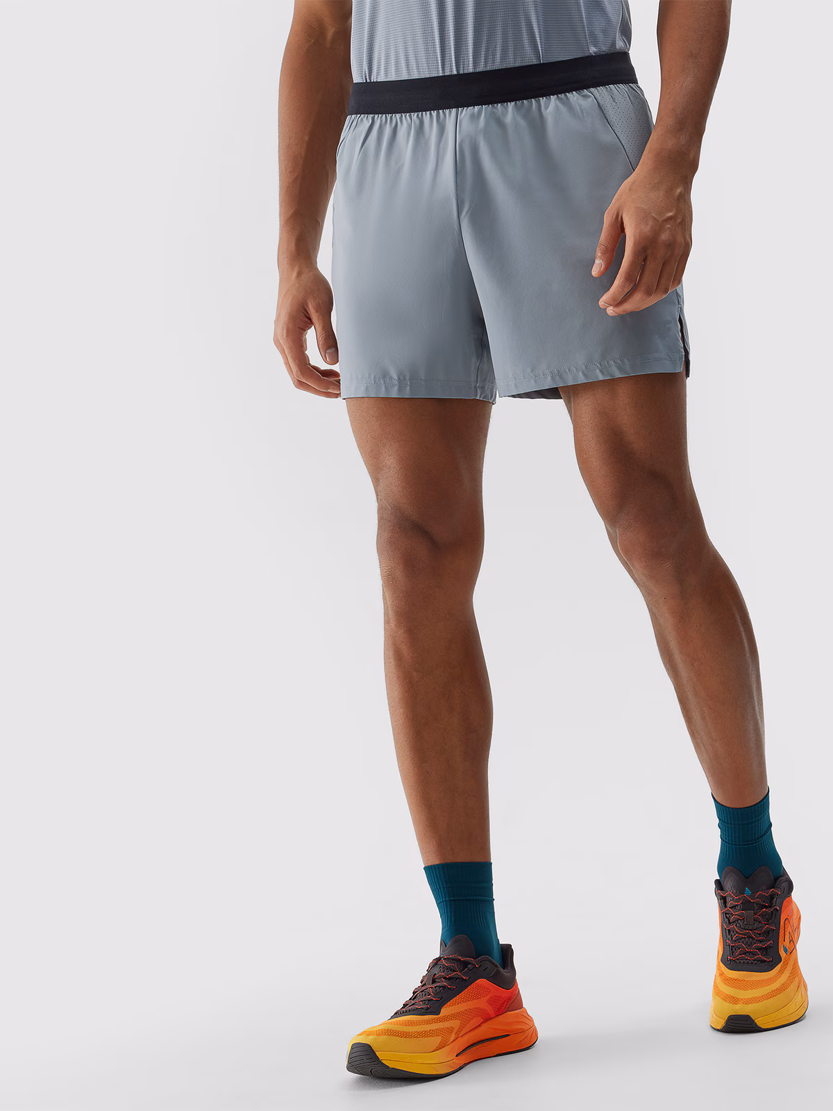 Spodenki do biegania szybkoschnące męskie - turkusowe