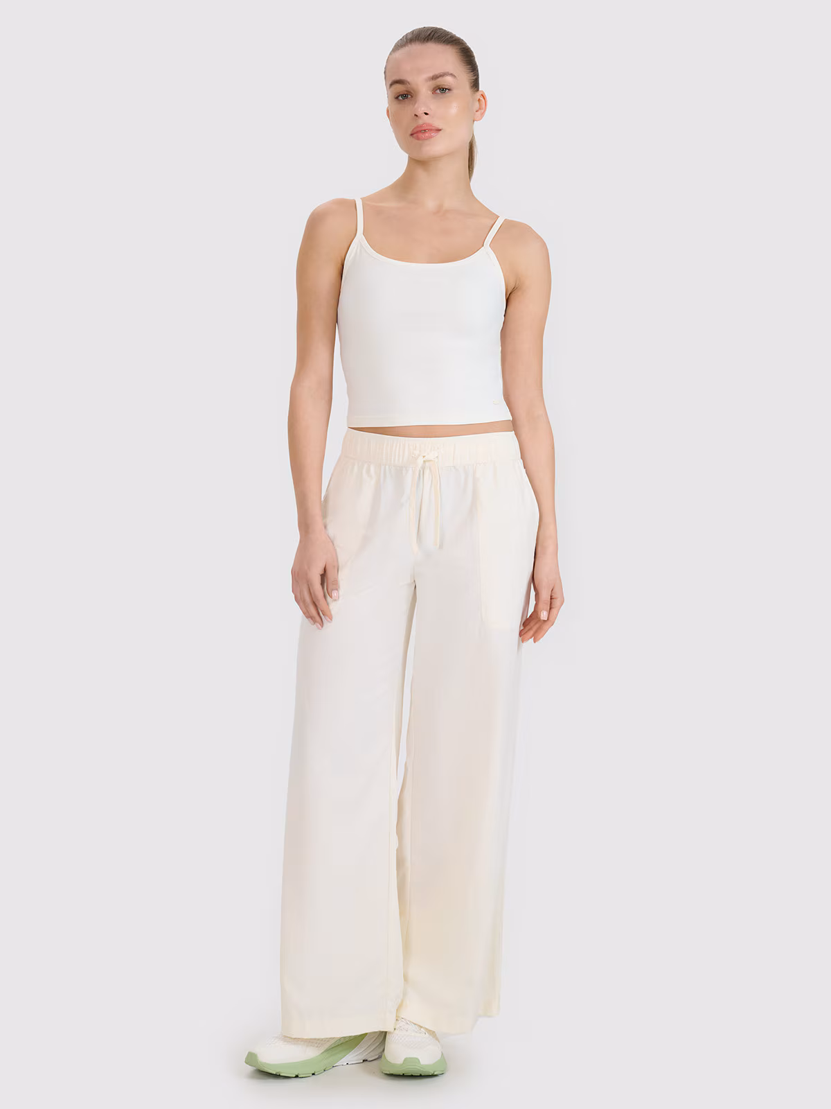 Spodnie casual z szerokimi nogawkami damskie - beżowe