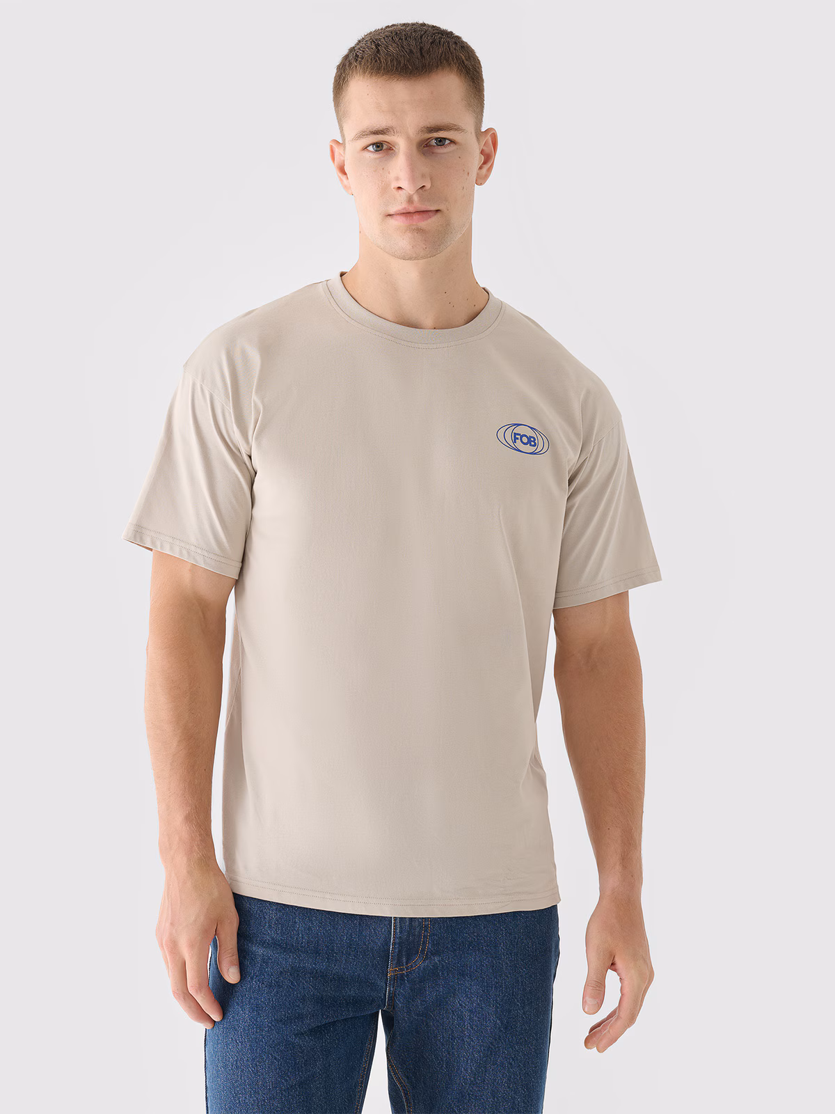 T-shirt oversize z nadrukiem męski - beżowy