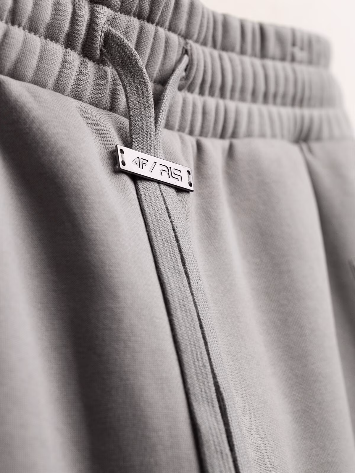 Spodnie dresowe joggery z bawełną organiczną męskie 4F x Robert Lewandowski