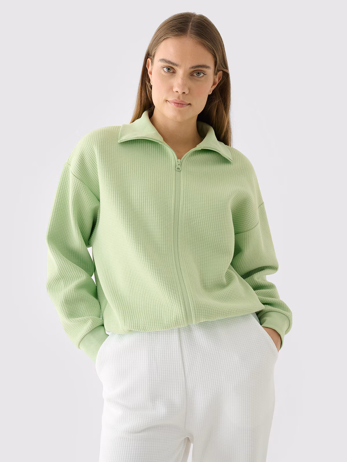 Bluza crop top rozpinana bez kaptura damska - zielona