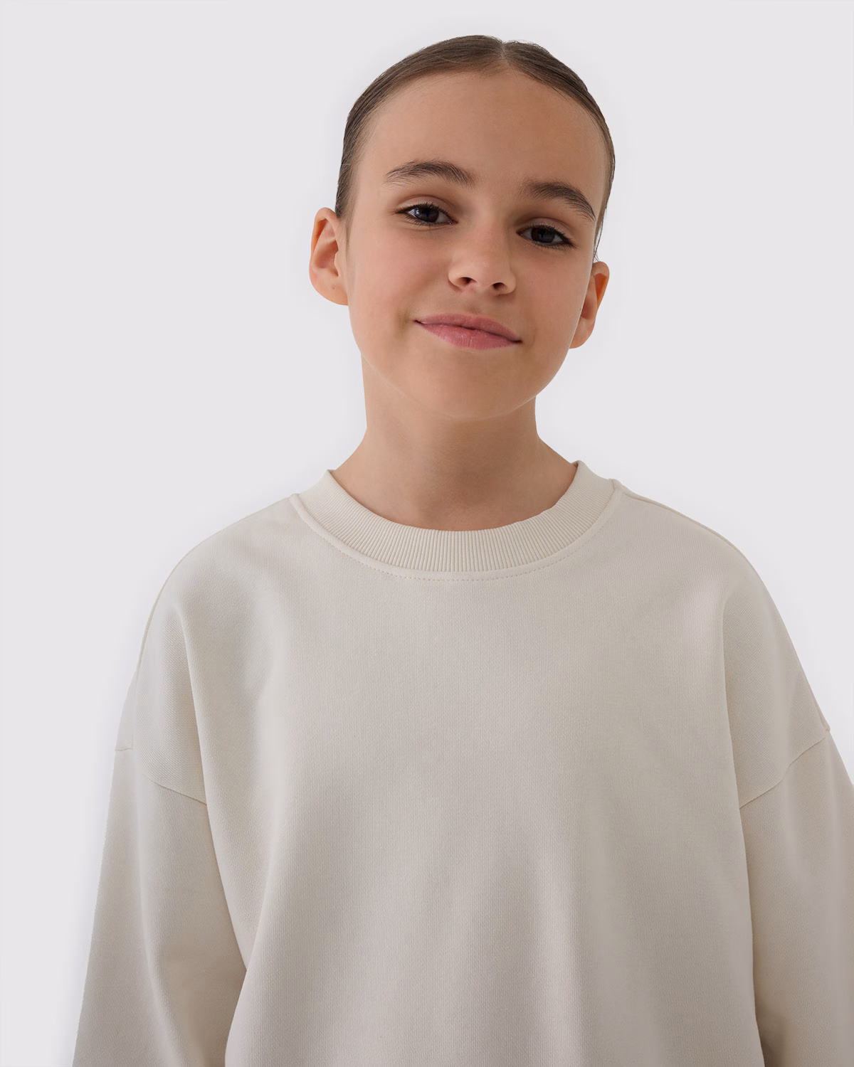 Bluza dresowa nierozpinana bez kaptura dziewczęca - beżowa