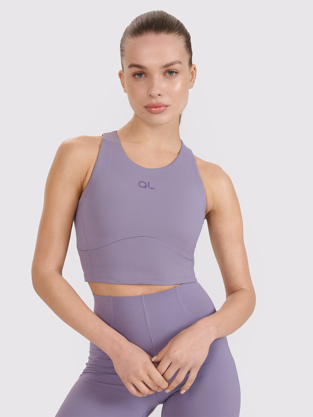 Crop top treningowy z wycięciem na plecach 4F x Anna Lewandowska - fioletowy