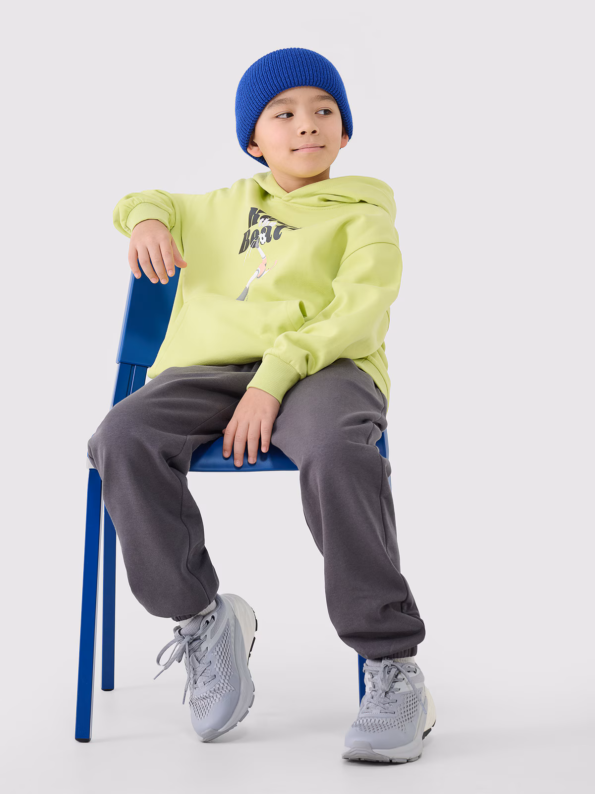 Bluza dresowa nierozpinana z kapturem chłopięca - żółta