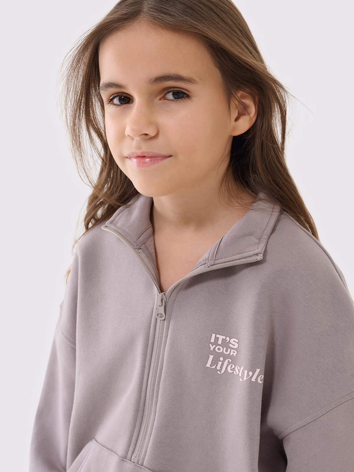 Bluza dresowa nierozpinana bez kaptura dziewczęca - beżowa