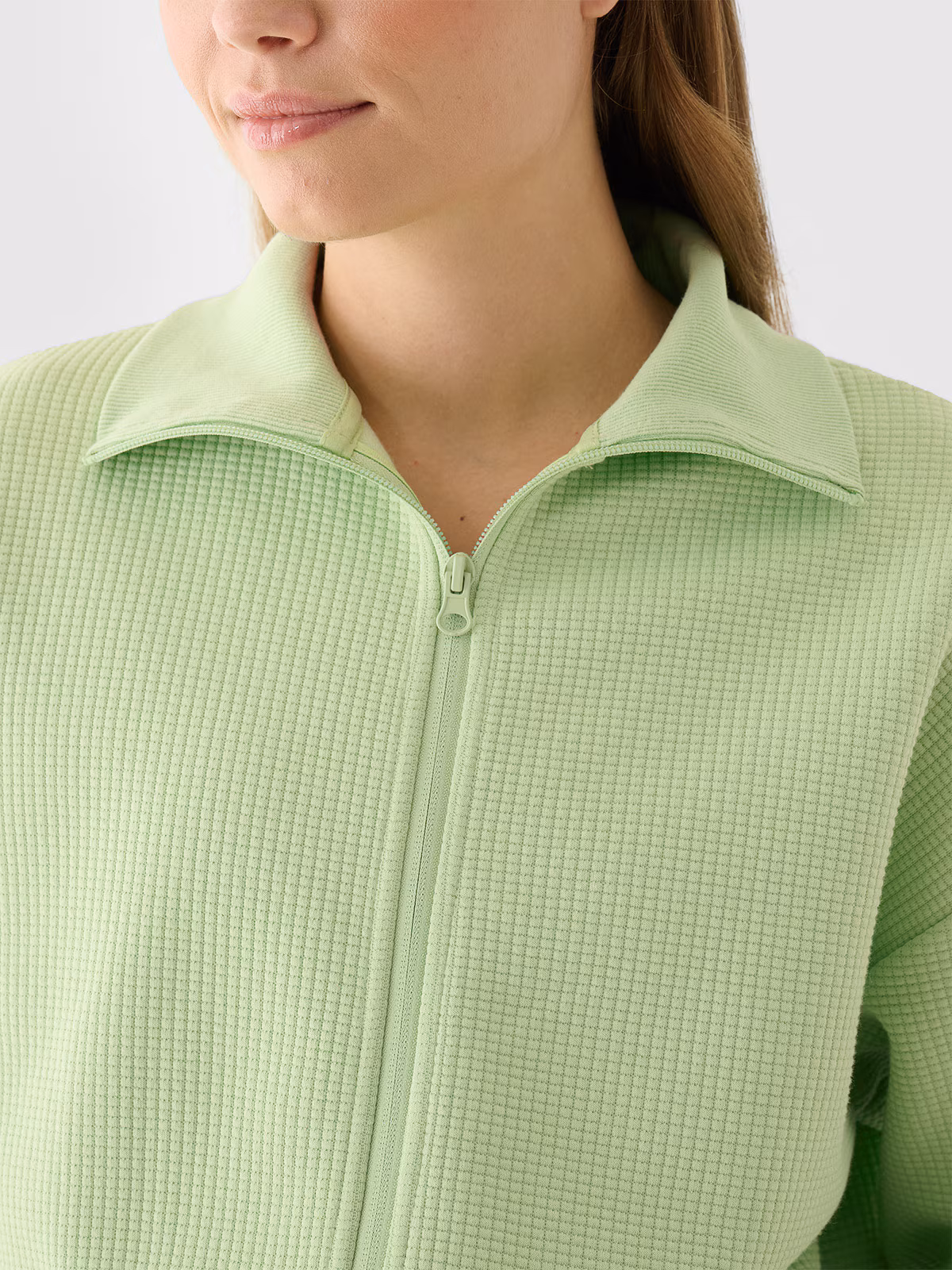 Bluza crop top rozpinana bez kaptura damska - zielona