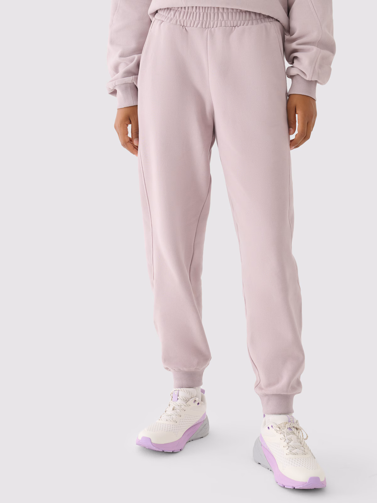 Spodnie dresowe oversize damskie 4F x Anna Lewandowska - czarne