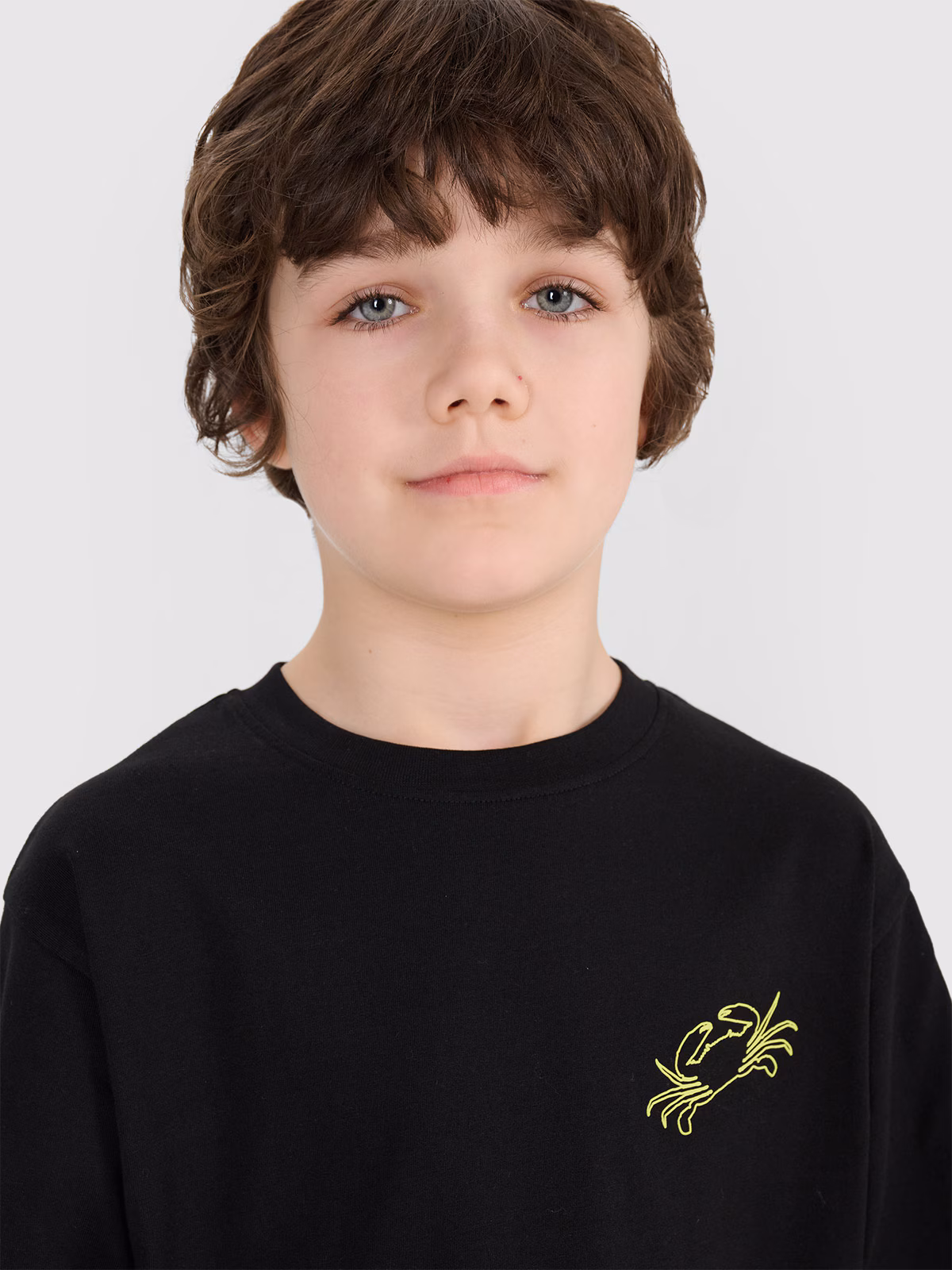 T-shirt oversize z nadrukiem chłopięcy - turkusowy