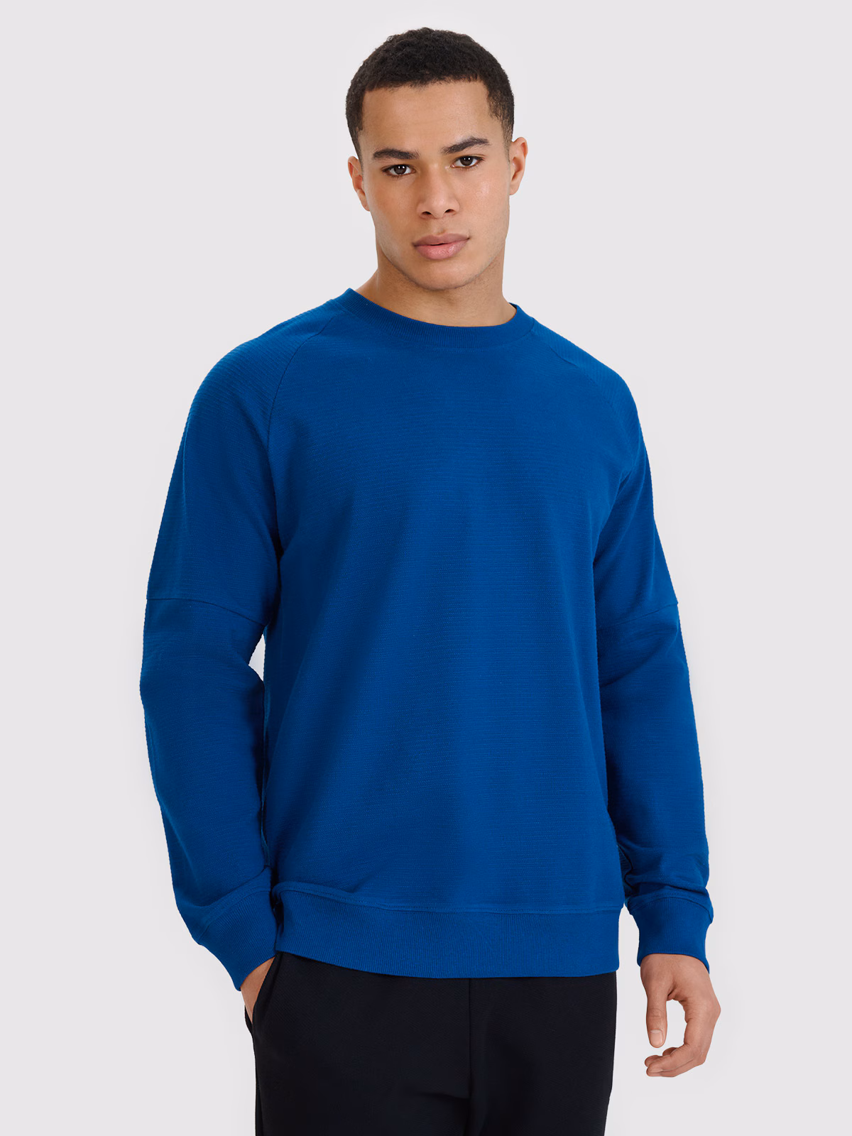 Bluza dresowa nierozpinana bez kaptura męska - niebieska