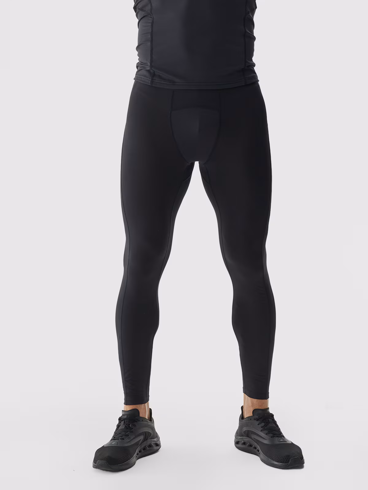 Legginsy treningowe ze średnim stanem męskie - czarne