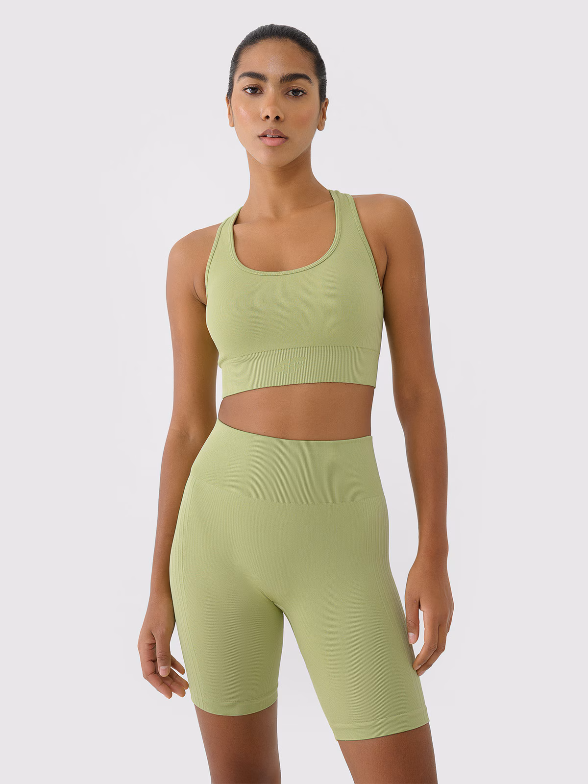 Biustonosz treningowy bezszwowy z niskim wsparciem damski - zielony