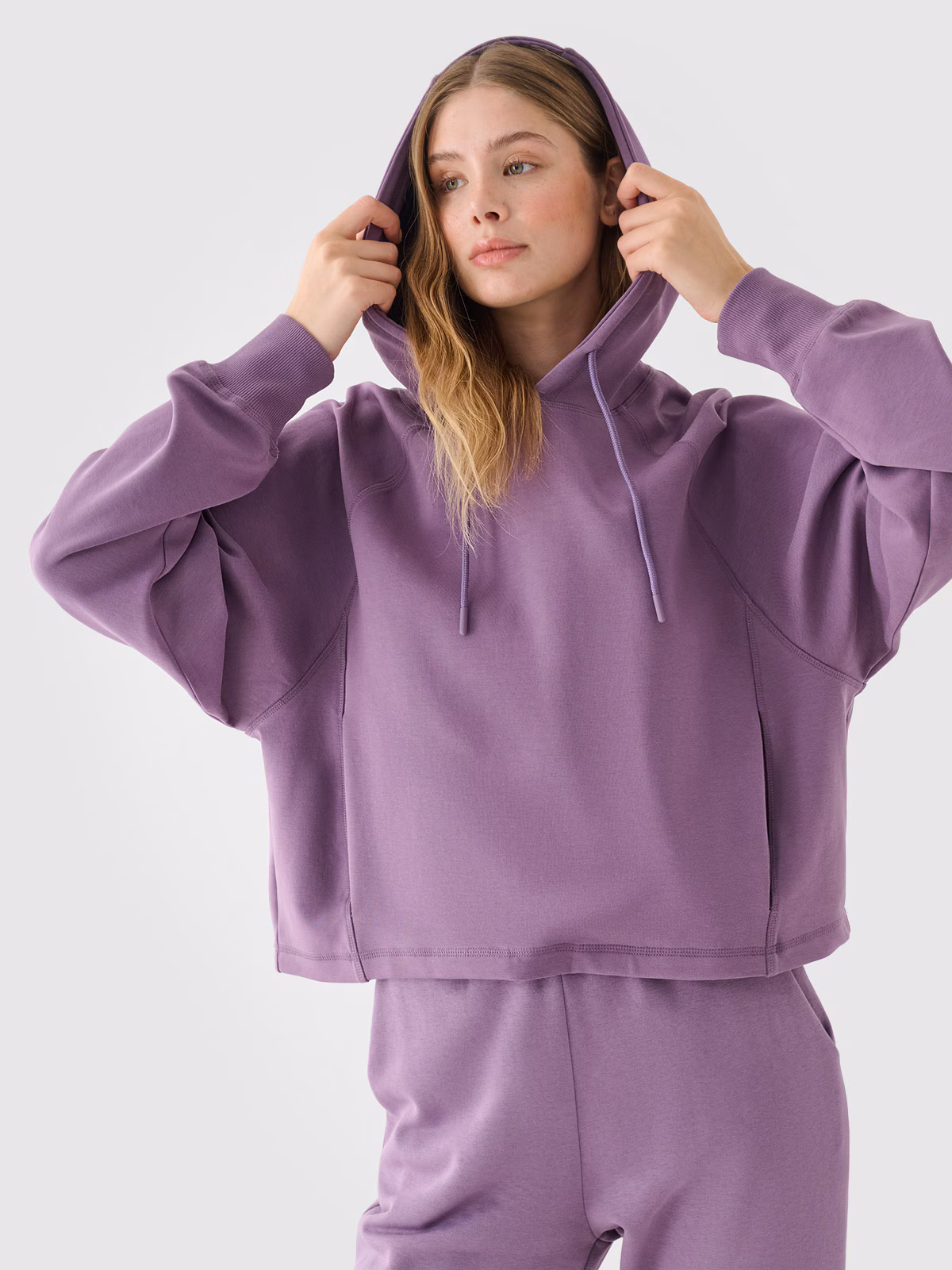 Bluza dresowa nierozpinana z kapturem damska - fioletowa