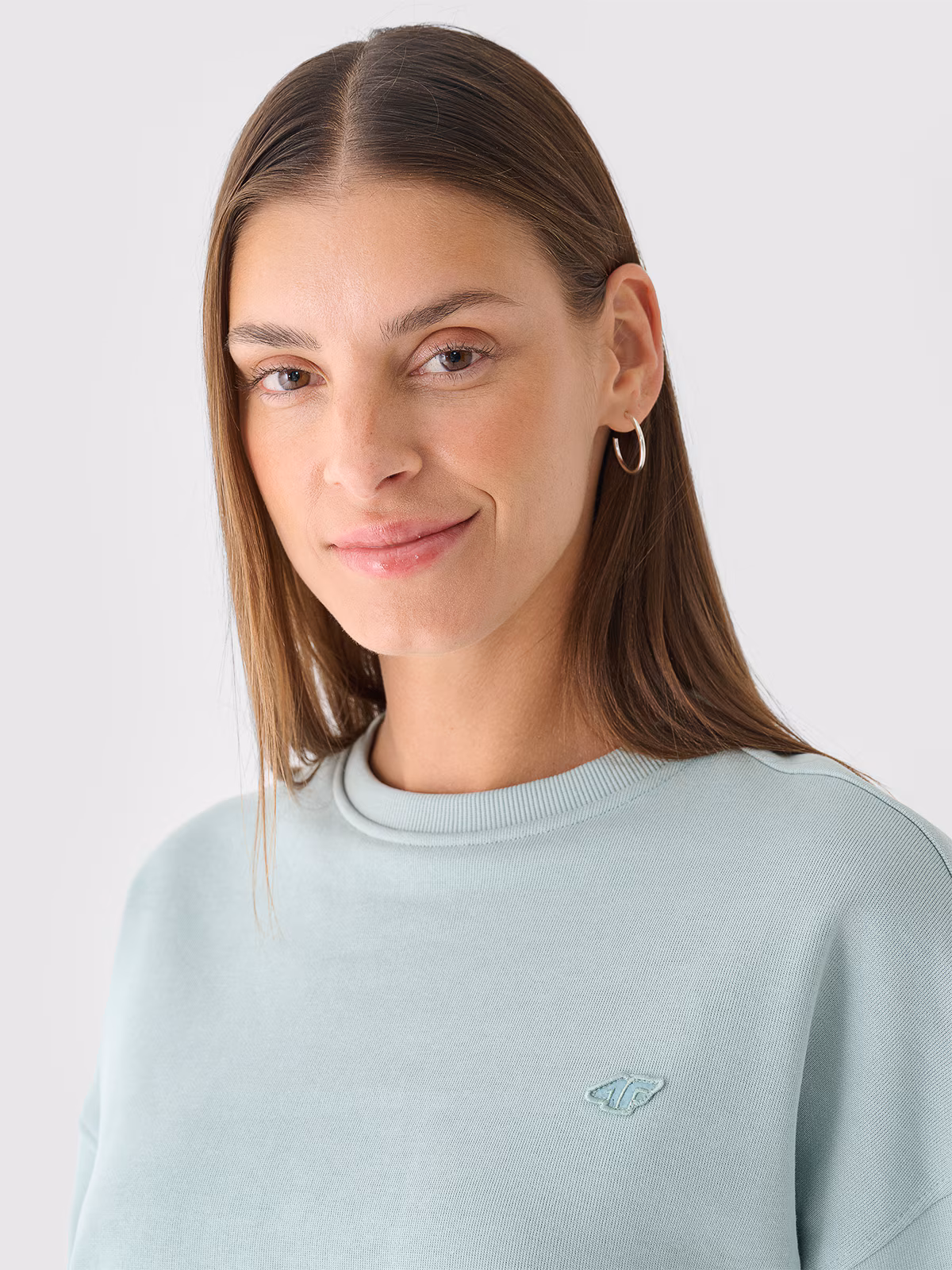 Bluza dresowa nierozpinana bez kaptura damska - różowa