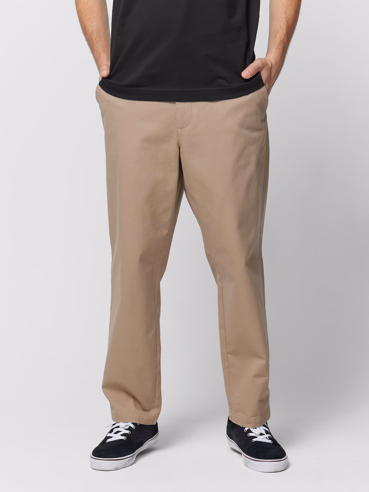 Spodnie tkaninowe o kroju carrot męskie Outhorn - beżowe