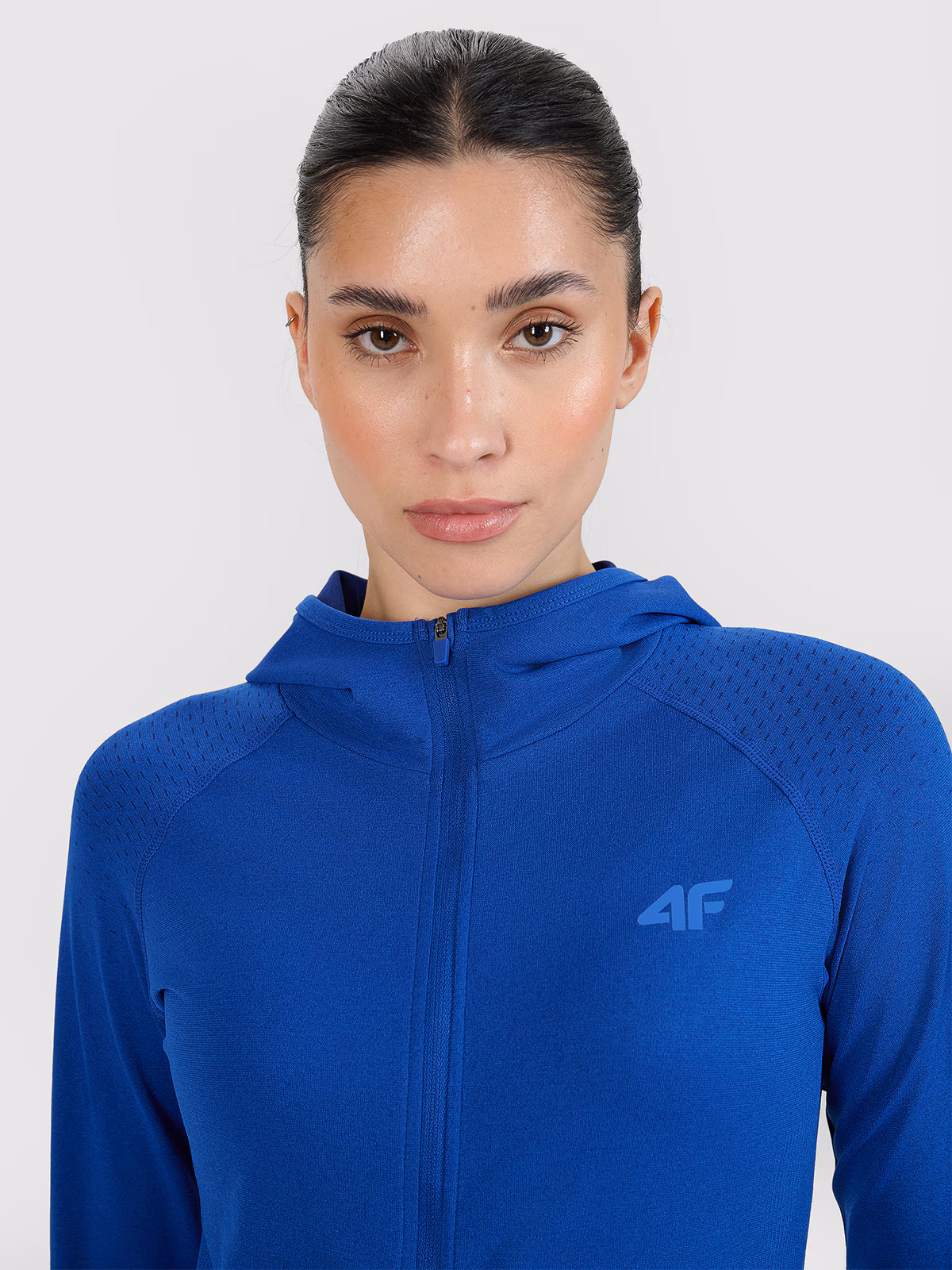 Bluza do biegania w terenie rozpinana z kapturem damska - niebieska