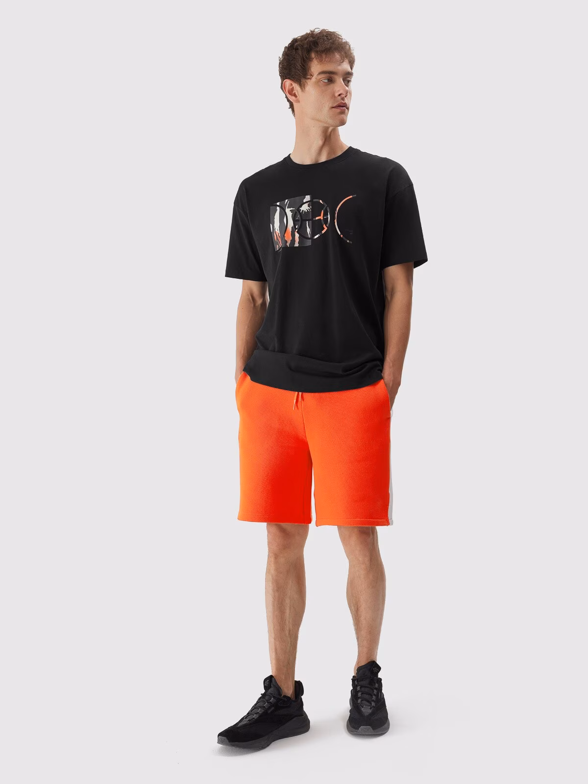 Spodenki dresowe męskie - pomarańczowe