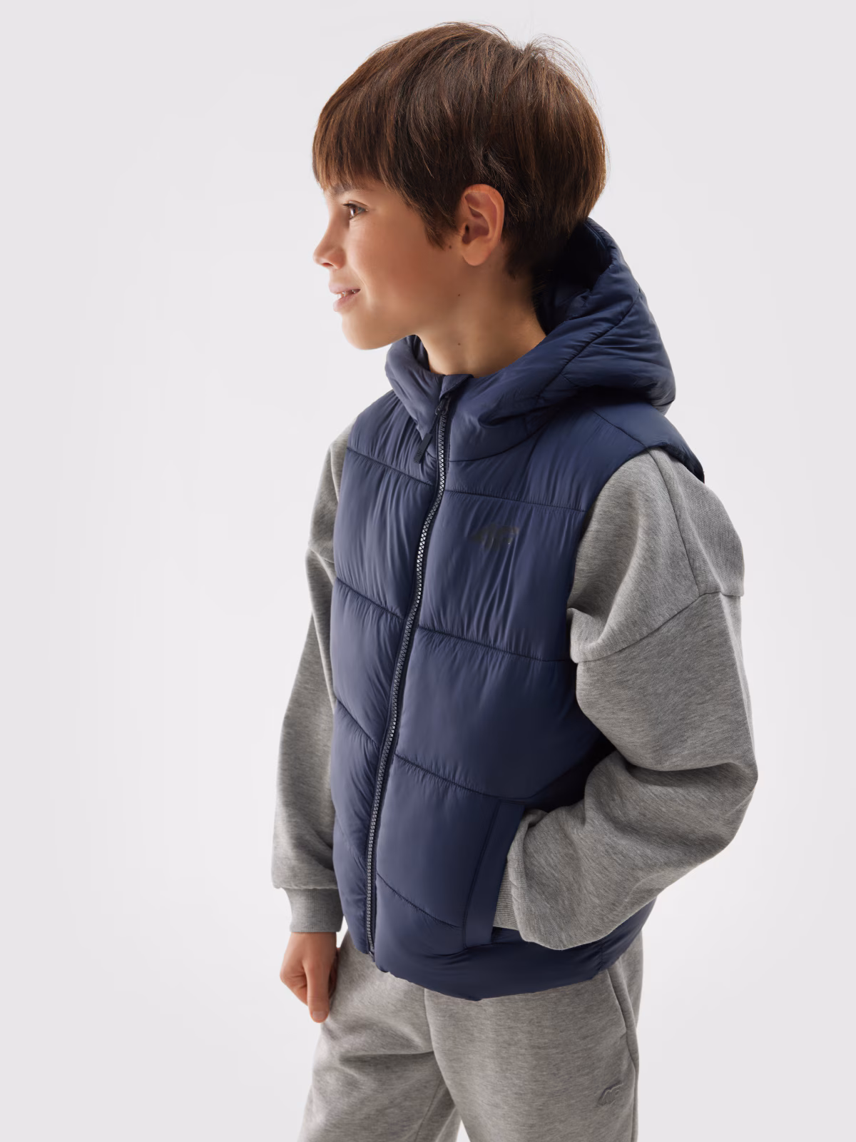 Bezrękawnik puchowy pikowany z kapturem chłopięcy - granatowy