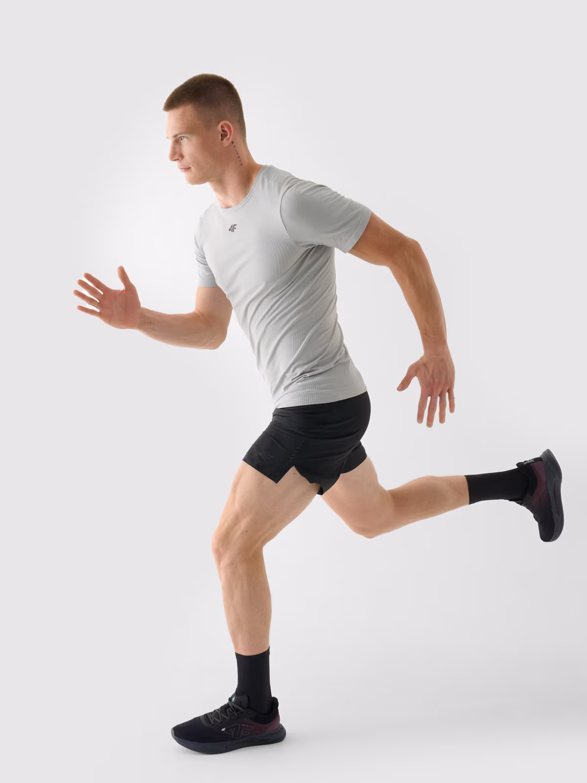 Spodenki do biegania szybkoschnące męskie - fioletowe